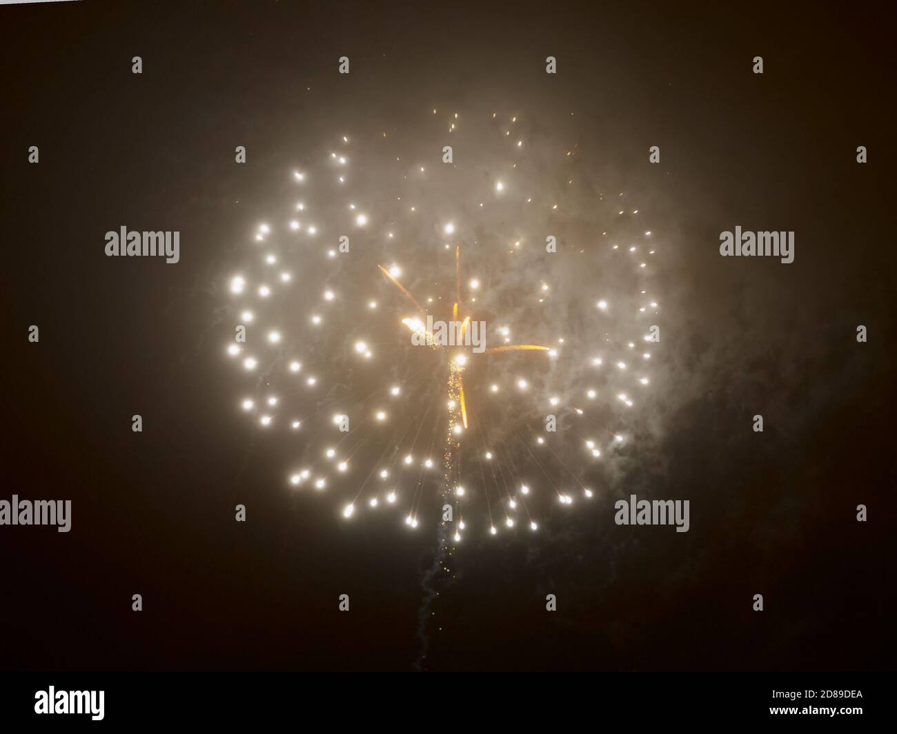 Fireworks at misty night, holiday celebration background with copy space Stock Photo