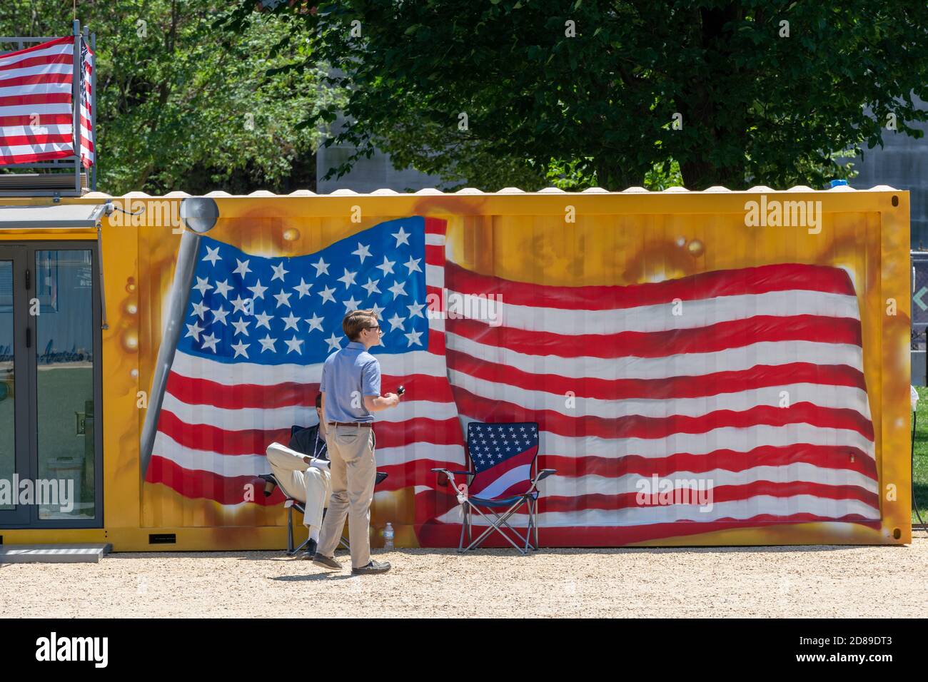 Stars and Stripes - a large US flag painted on the side of a display stand on the National Mall in Washington DC. The flag has only 36 stars. Stock Photo