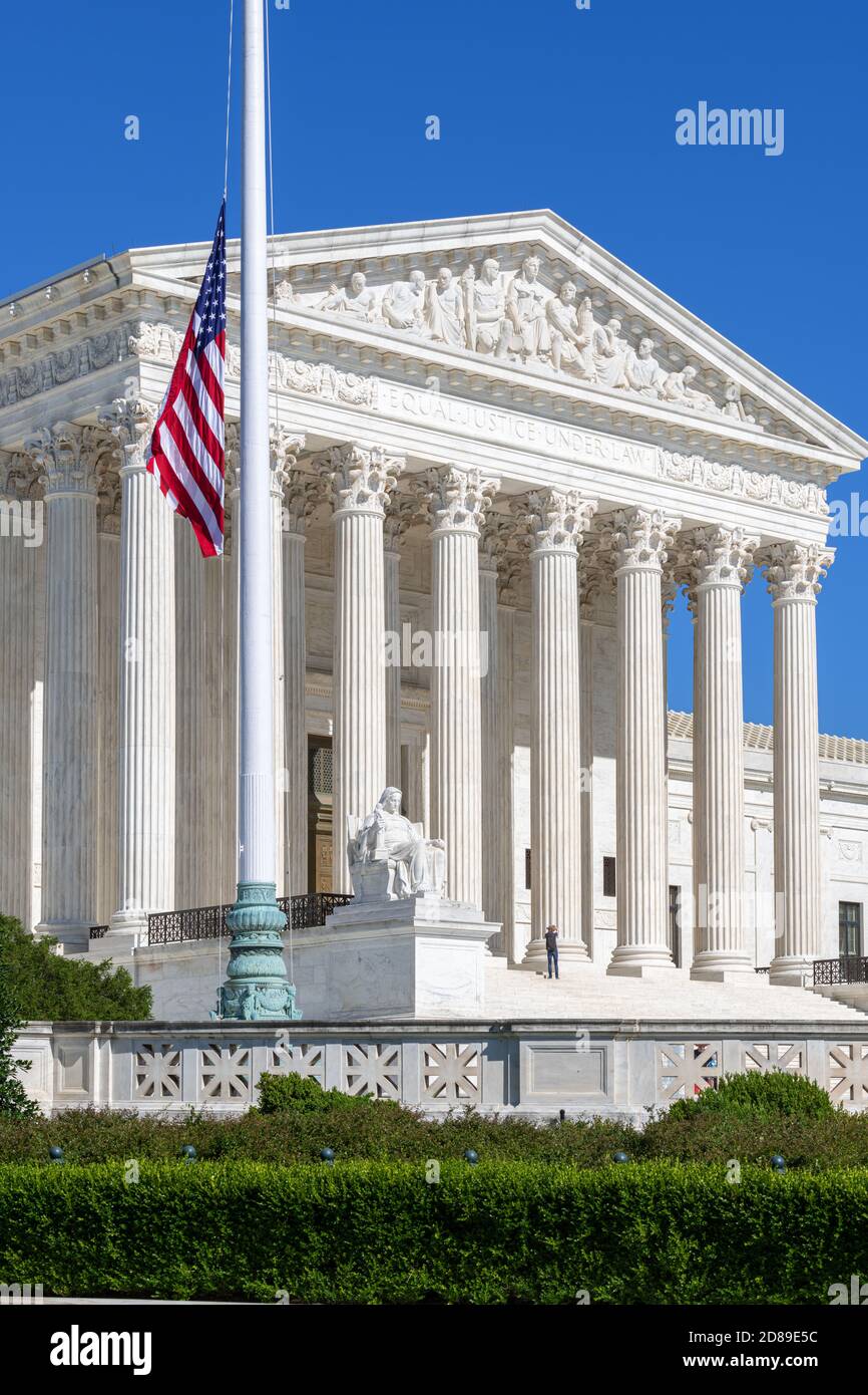 The Stars & Stripes flag flies at half mast at the Supreme Court of the United States in Washington, DC. Stock Photo