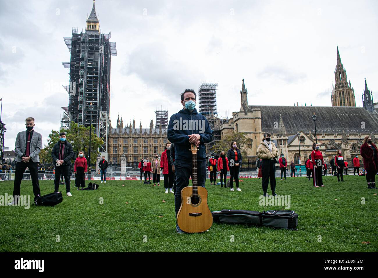 WESTMINSTER LONDON,UK  28 October 2020. Singers and musicians  attend Survival in the Square in a series of creative activations  to highlight that the live events and entertainment sector urgently needs support from national and local governments to survive the Covid-19 crisis and to help the industry back to work while providing support until it can fully return to work. Credit: amer ghazzal/Alamy Live News Stock Photo