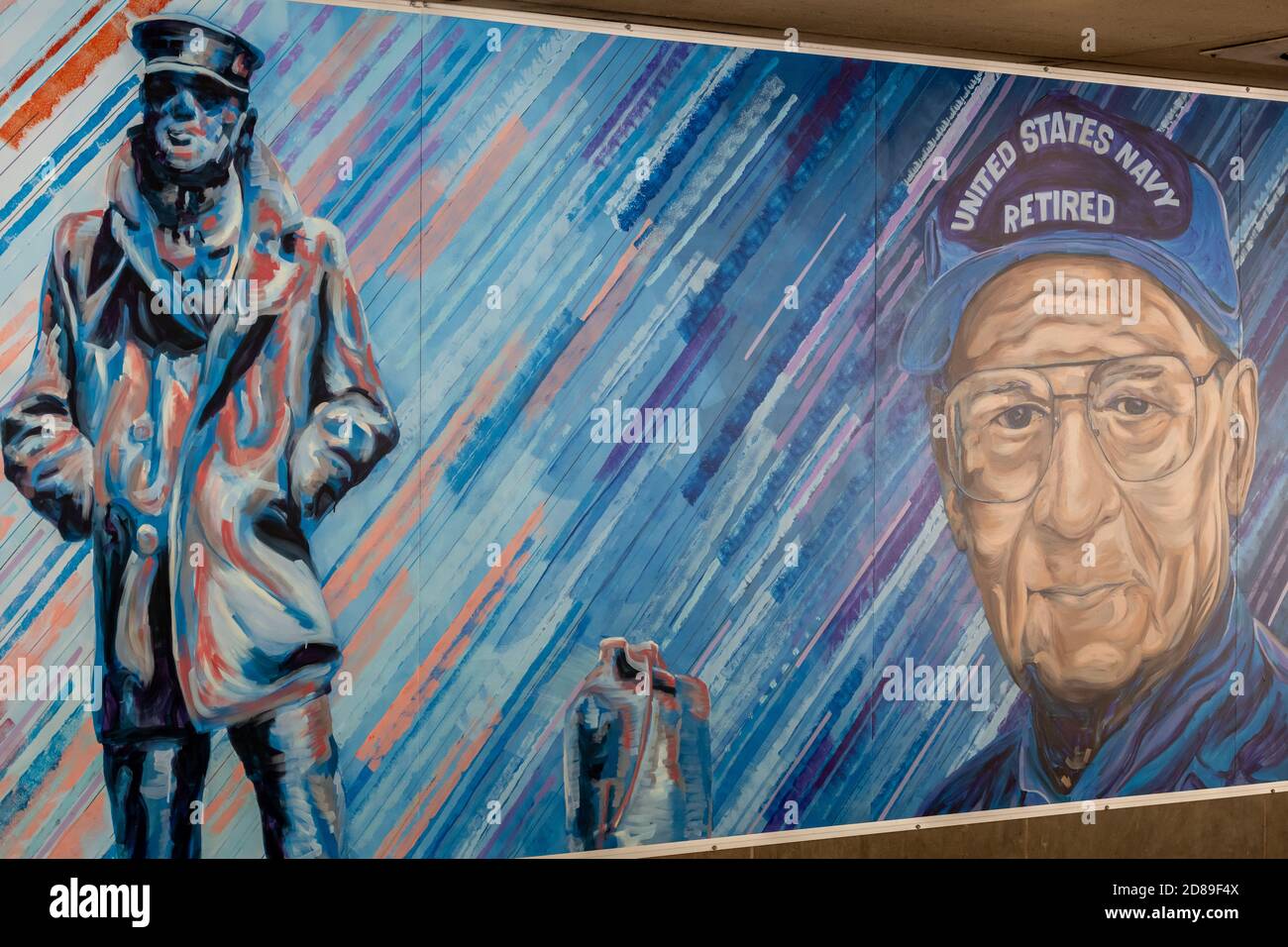 Addison Karl's colourful mural “In Service” at the Vermont Avenue entrance to McPherson Square Metrorail Station honours US Veterans through the ages Stock Photo