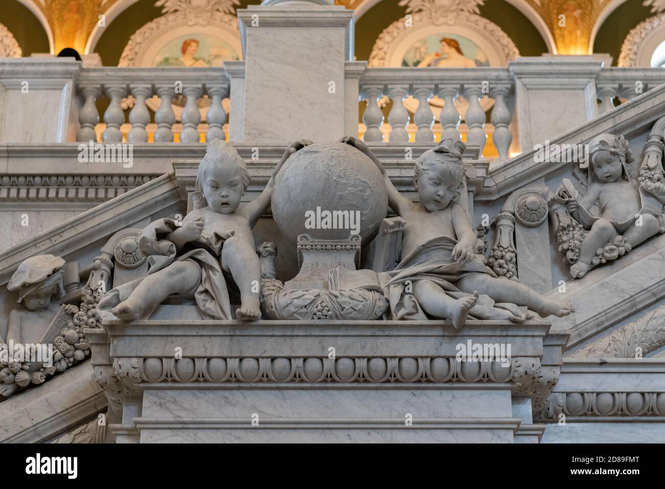 Philip Martiny's cherubs, representing Asia and Europe, carved into the Grand Staircase of the Library of Congress Jefferson Building, Washington, DC. Stock Photo
