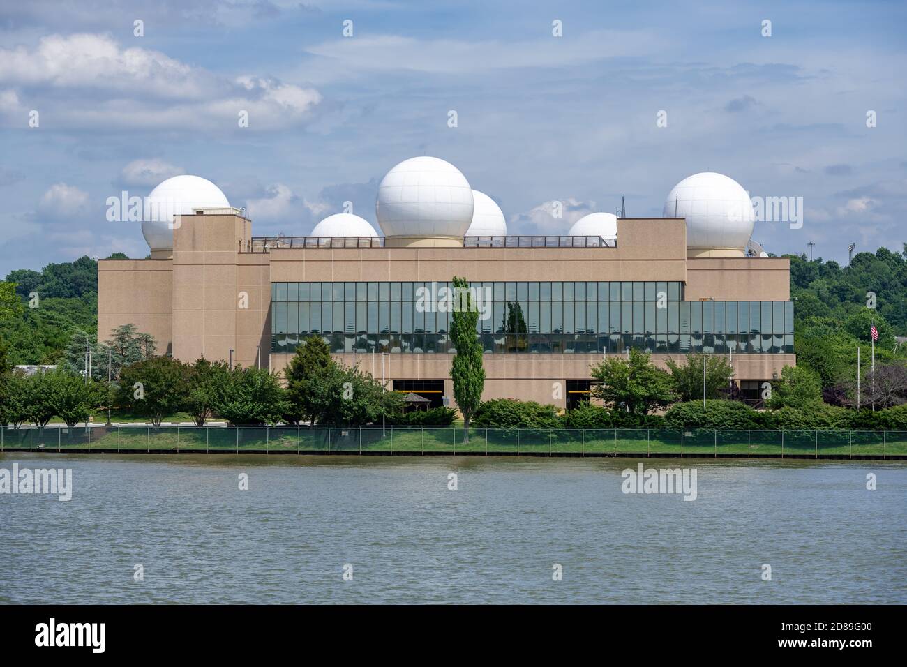 Prominent white radomes on the roof of this building in the US Navy Research laboratory campus allude to NRL's pioneering work on radar  development Stock Photo