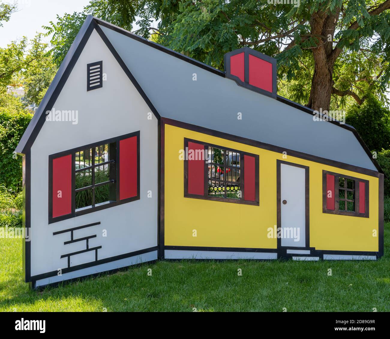 Roy Lichtenstein's 'House I' artwork, fabricated in painted aluminium, gives the illusion of the side projecting towards the viewer while bending away Stock Photo