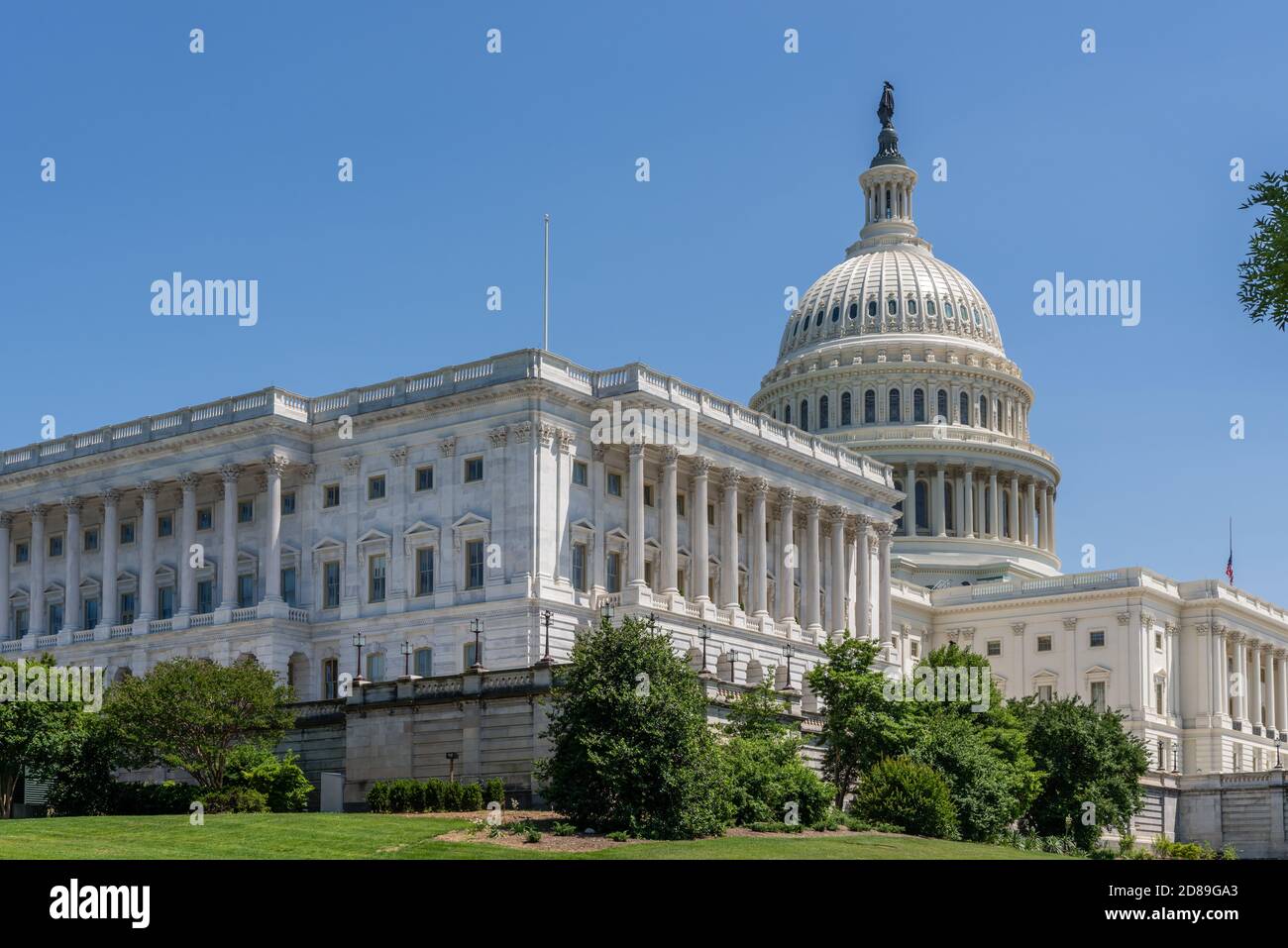 Thomas U. Walter's magnificent cast-iron dome of the US Capitol rises 288' above the Senate Building and Capitol Hill in Washington DC Stock Photo