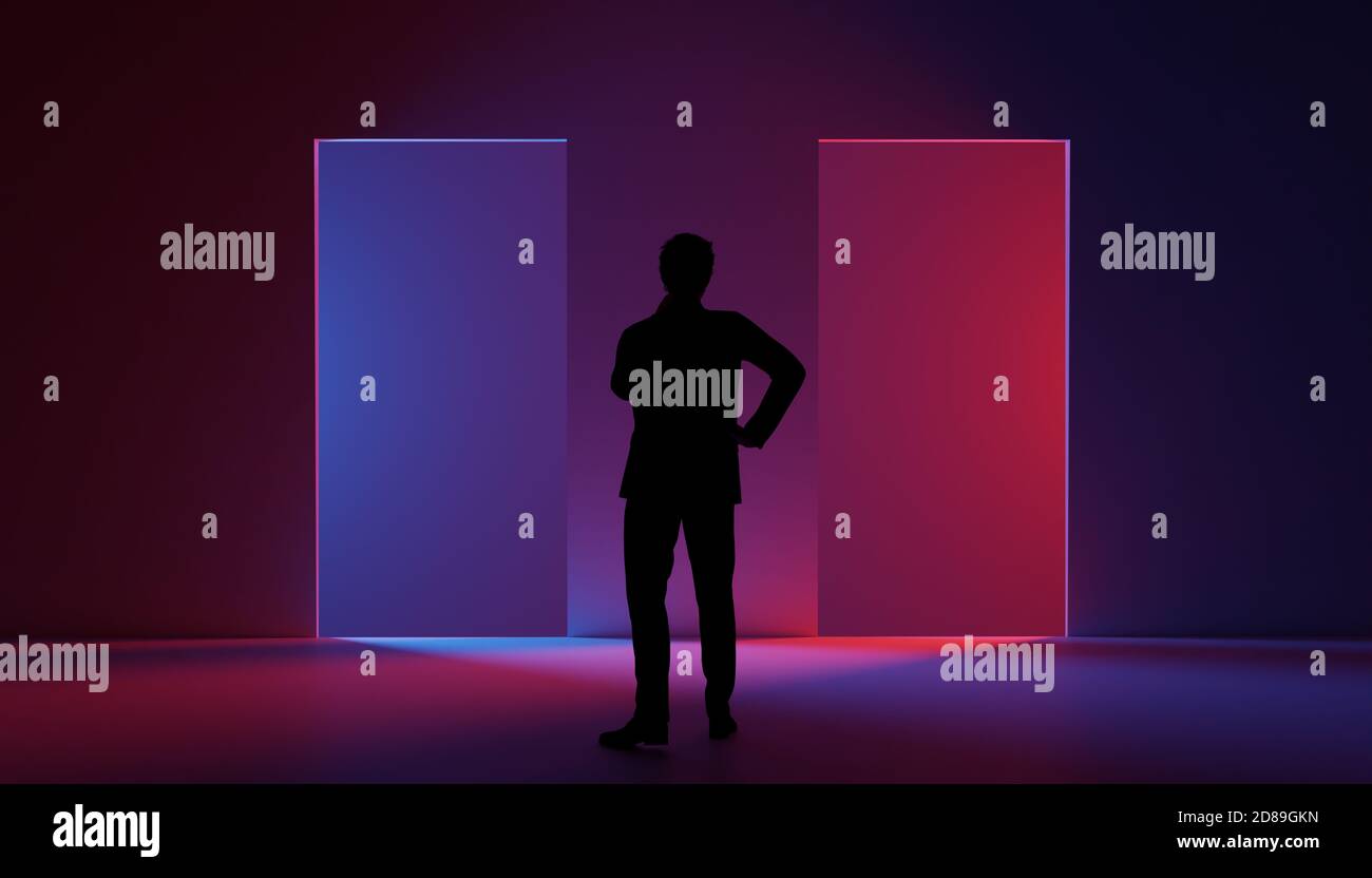 Silhouette of thinking man in front of illuminated blue and red doorway Stock Photo