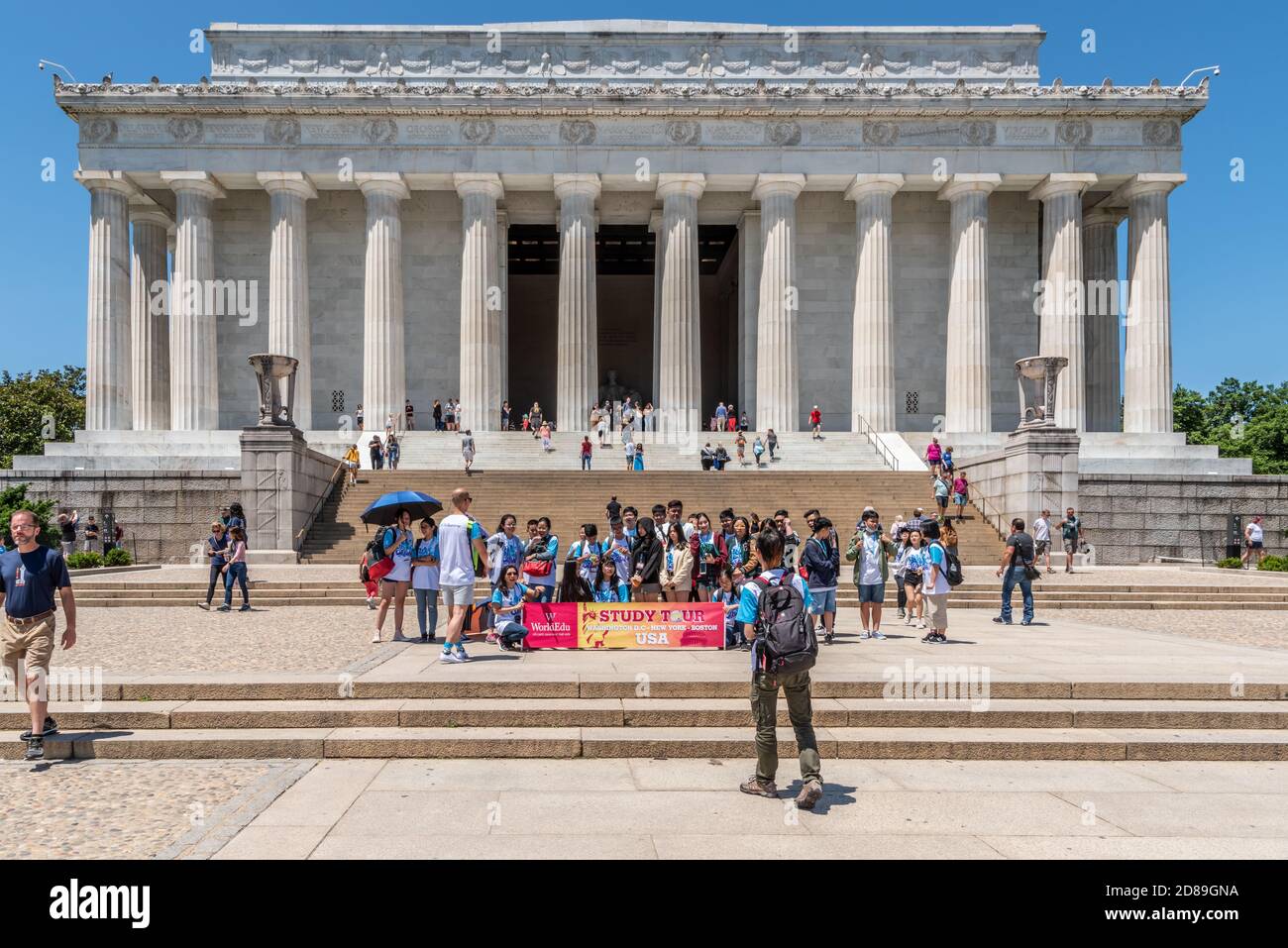A group of Vietnamese students gather for a photograph in front of the Lincoln Memorial in Washington DC Stock Photo