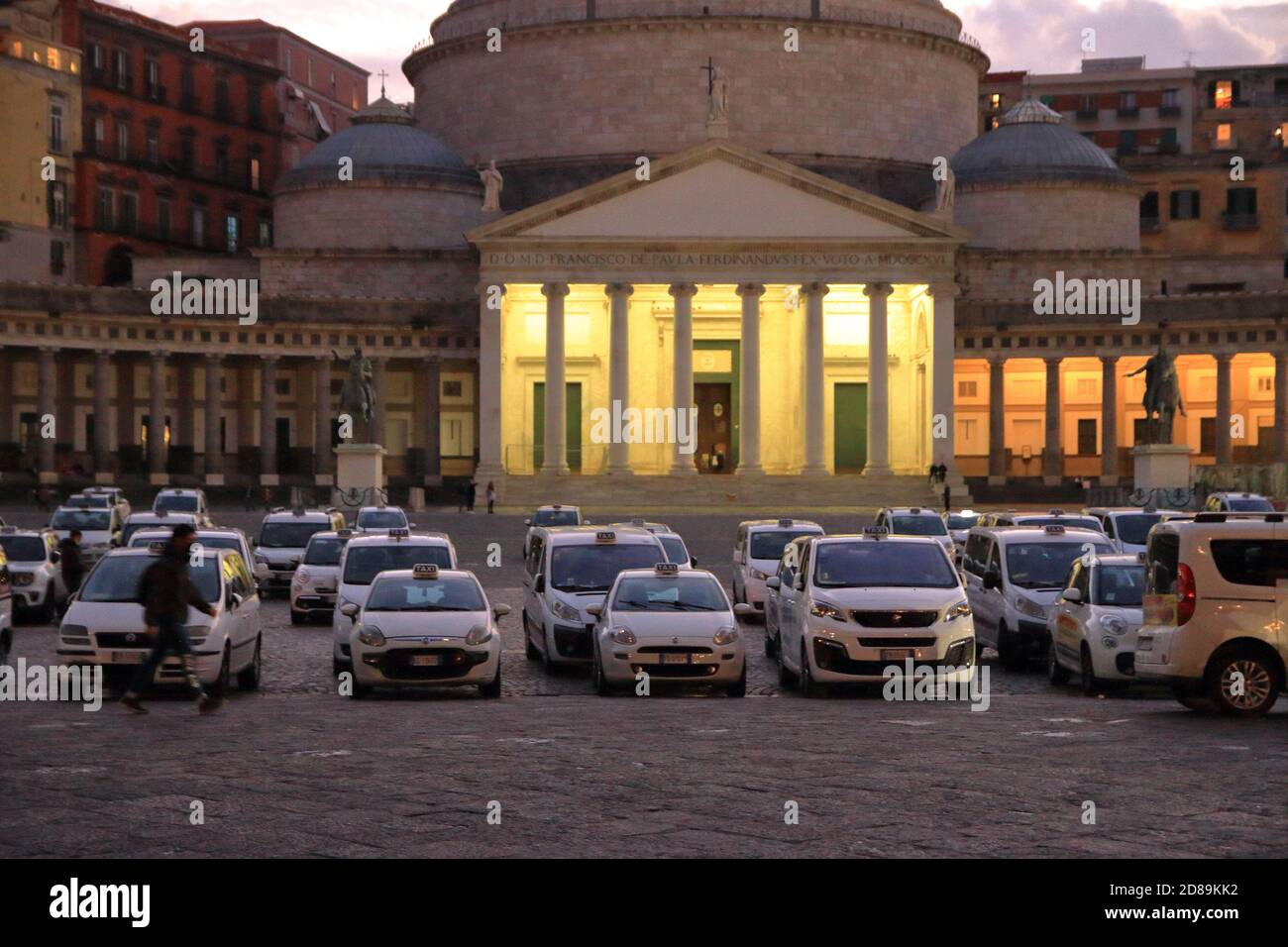 All taxi drivers from Naples gathered in Piazza del Plebiscito to report the difficulties of their profession due to the continuing restrictive. Stock Photo