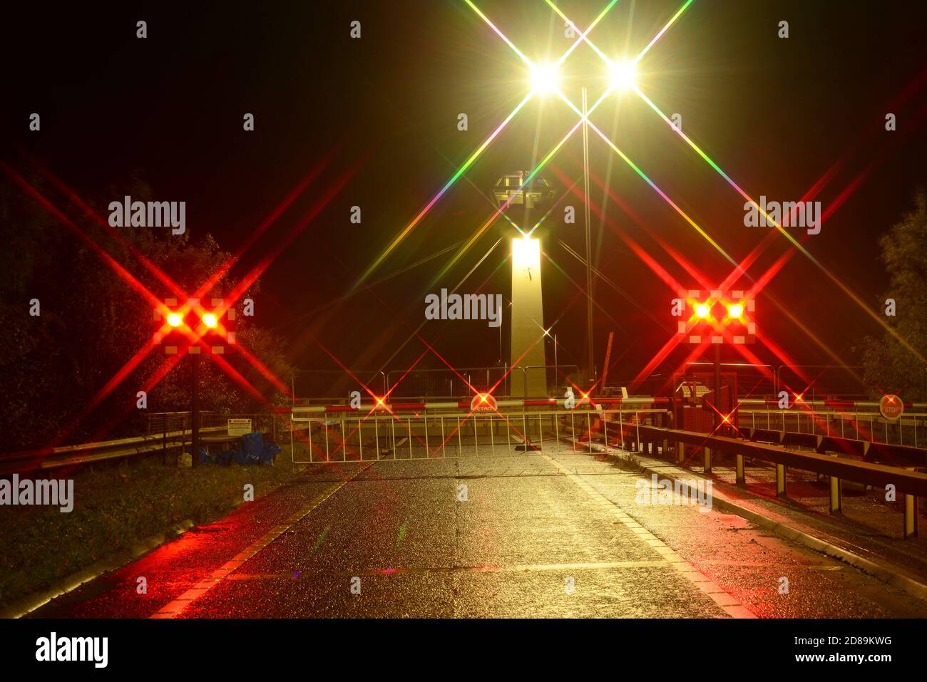 warning lights flashing warning motorists of selby swingbridge open river ouse yorkshire united kingdom Stock Photo