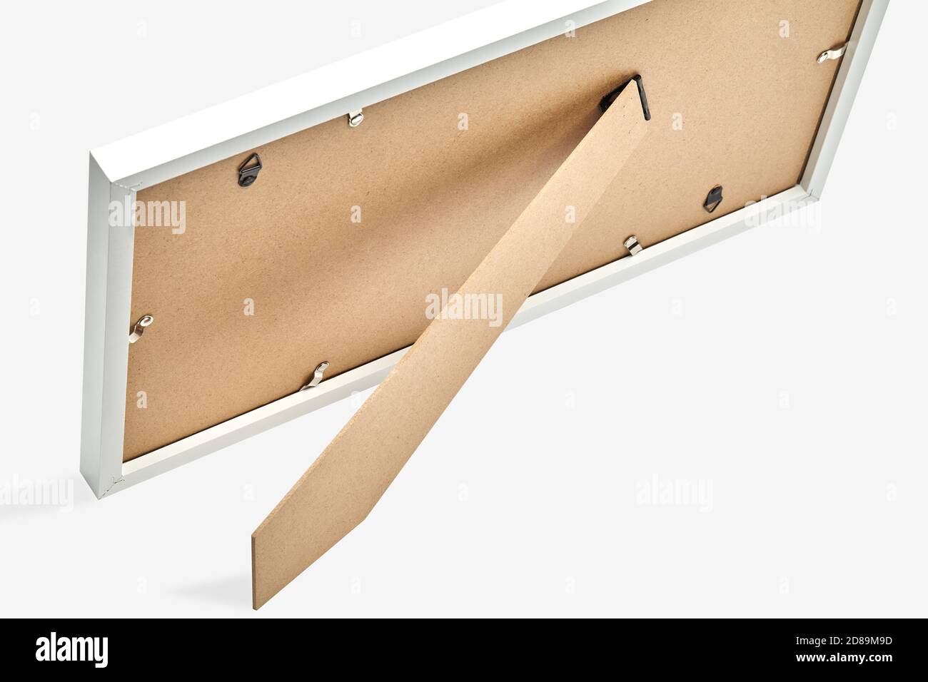 Back side of photo frame isolated on white background. Cardboard