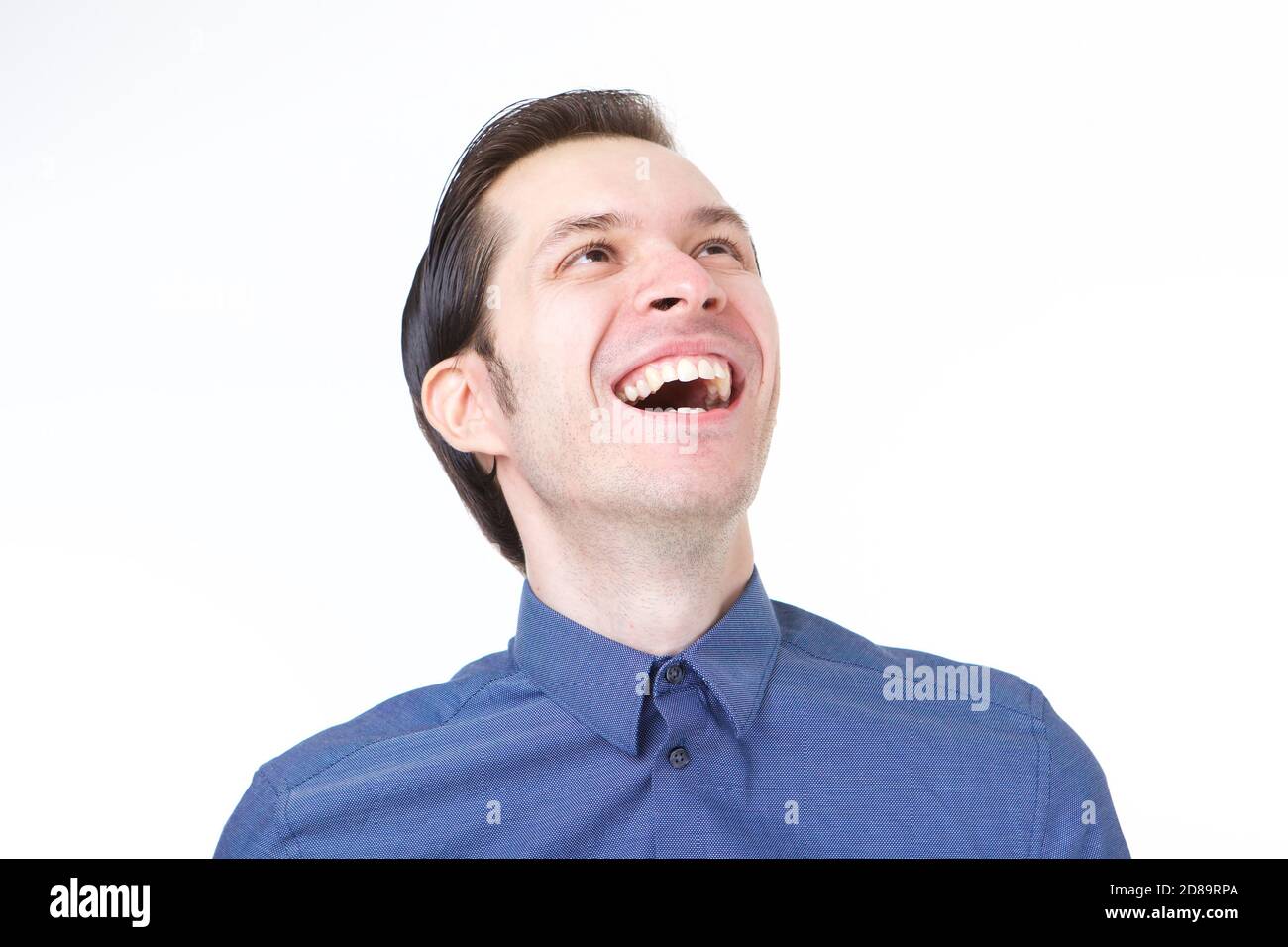 Close up portrait of laughing business casual man on white background ...