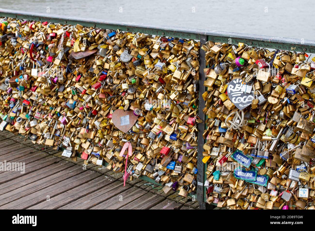 Paris , seine / France - 09 20 2020 : The Pont des Arts padlock Fence of love  locks attached to the bridge gates in paris Stock Photo - Alamy