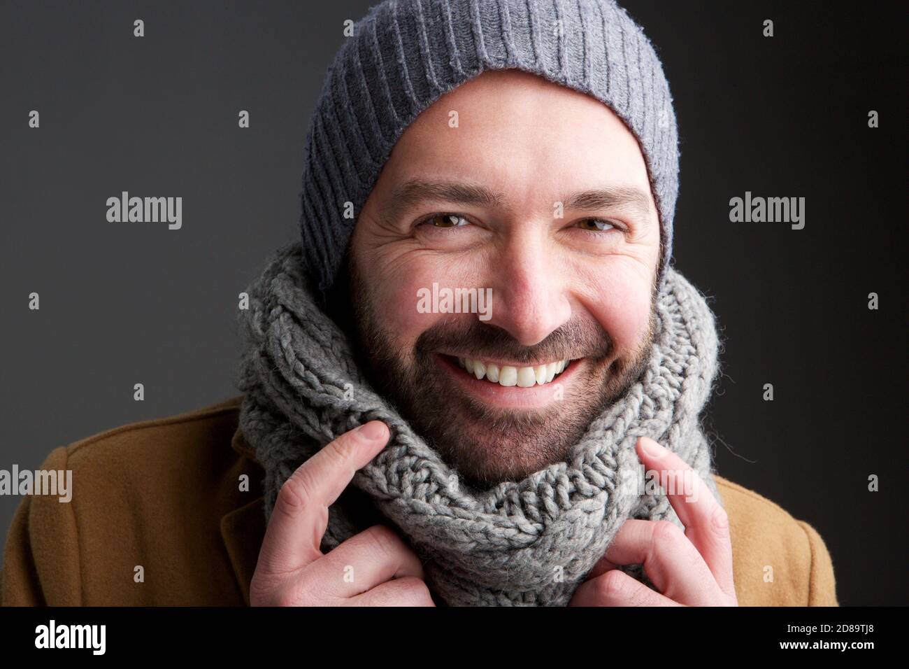 Portrait of middle age man with hat and scarf Stock Photo
