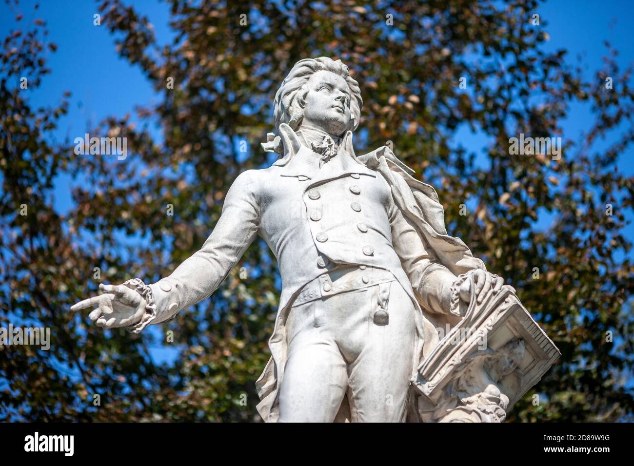 A statue of composer Wolfgang Amadeus Mozart in Vienna, capital of Austria and the country's largest city. Mozart is closely identified with Vienna. Stock Photo
