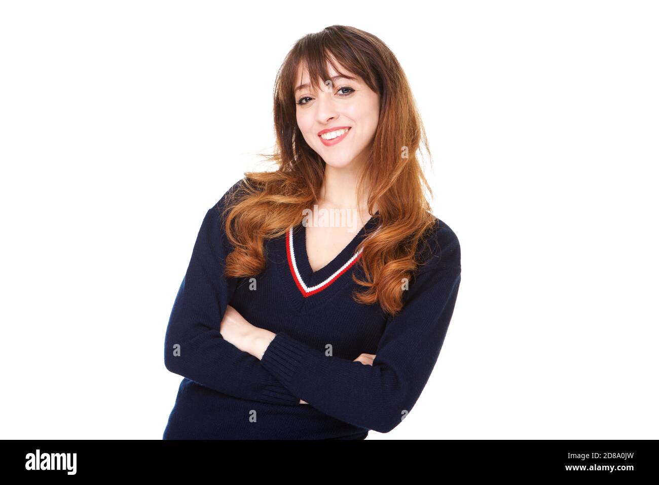 Portrait of smiling young woman against isolated white background with ...