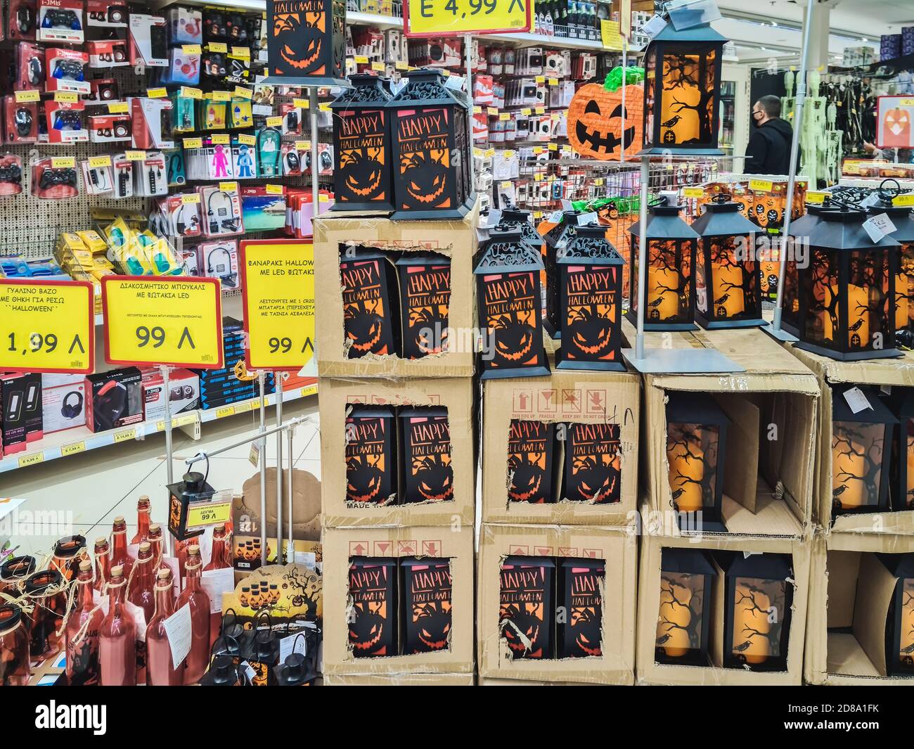 Halloween supermarket products on shelf. Festive decorations including