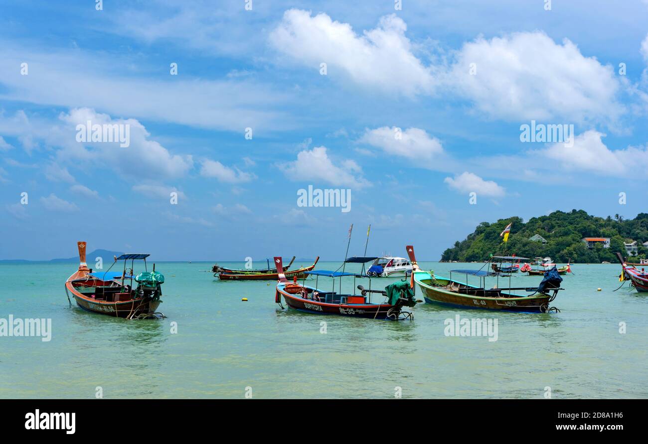 Phuket, Thailand - 06 August 2020: Fishing boats moored at Chalong Bay Pier. Stock Photo