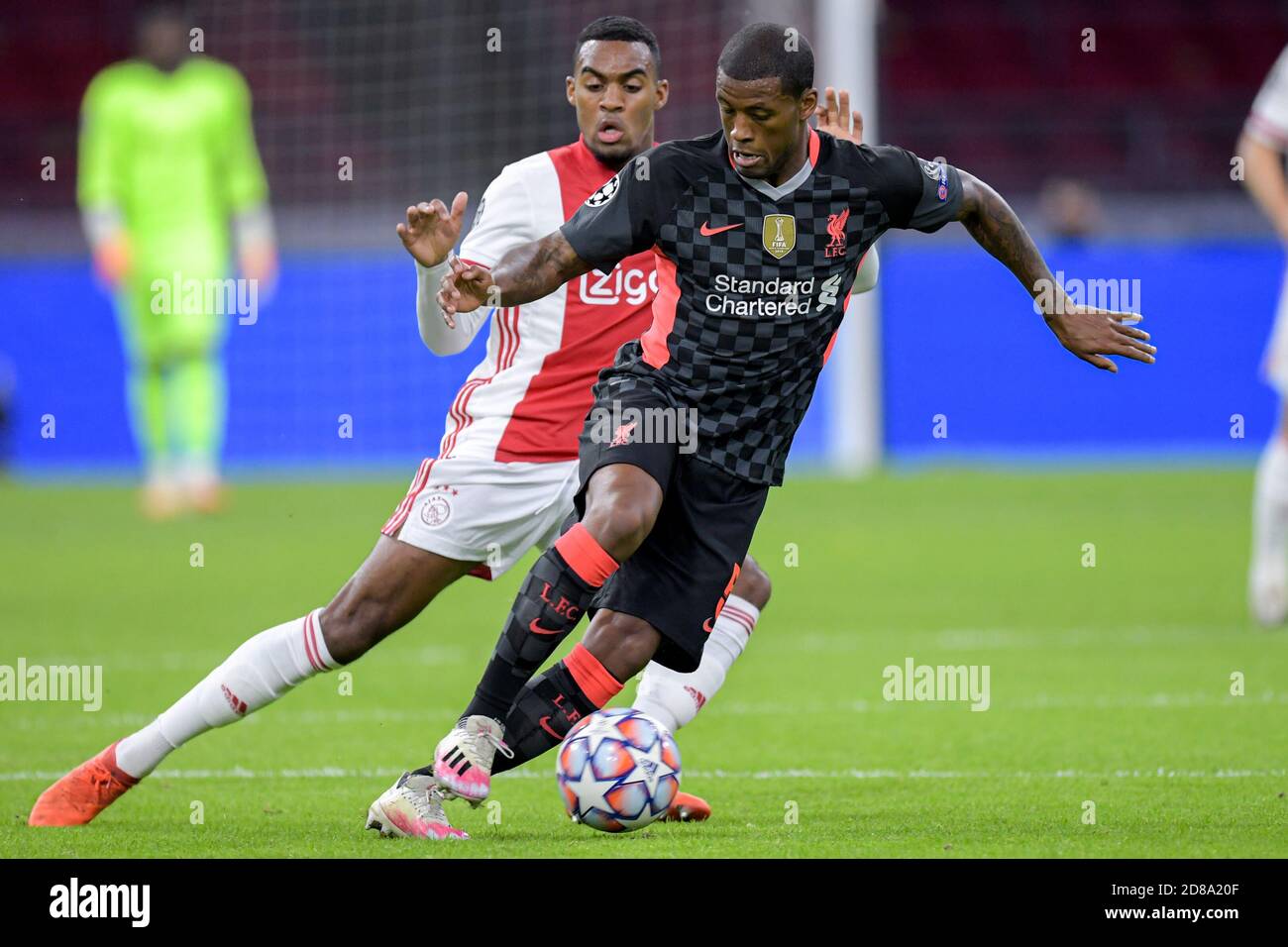 Ryan Gravenberch of Ajax, Georginio Wijnaldum of Liverpool FC during the UEFA Champions League, Group Stage, Group D football match between Ajax and C Stock Photo