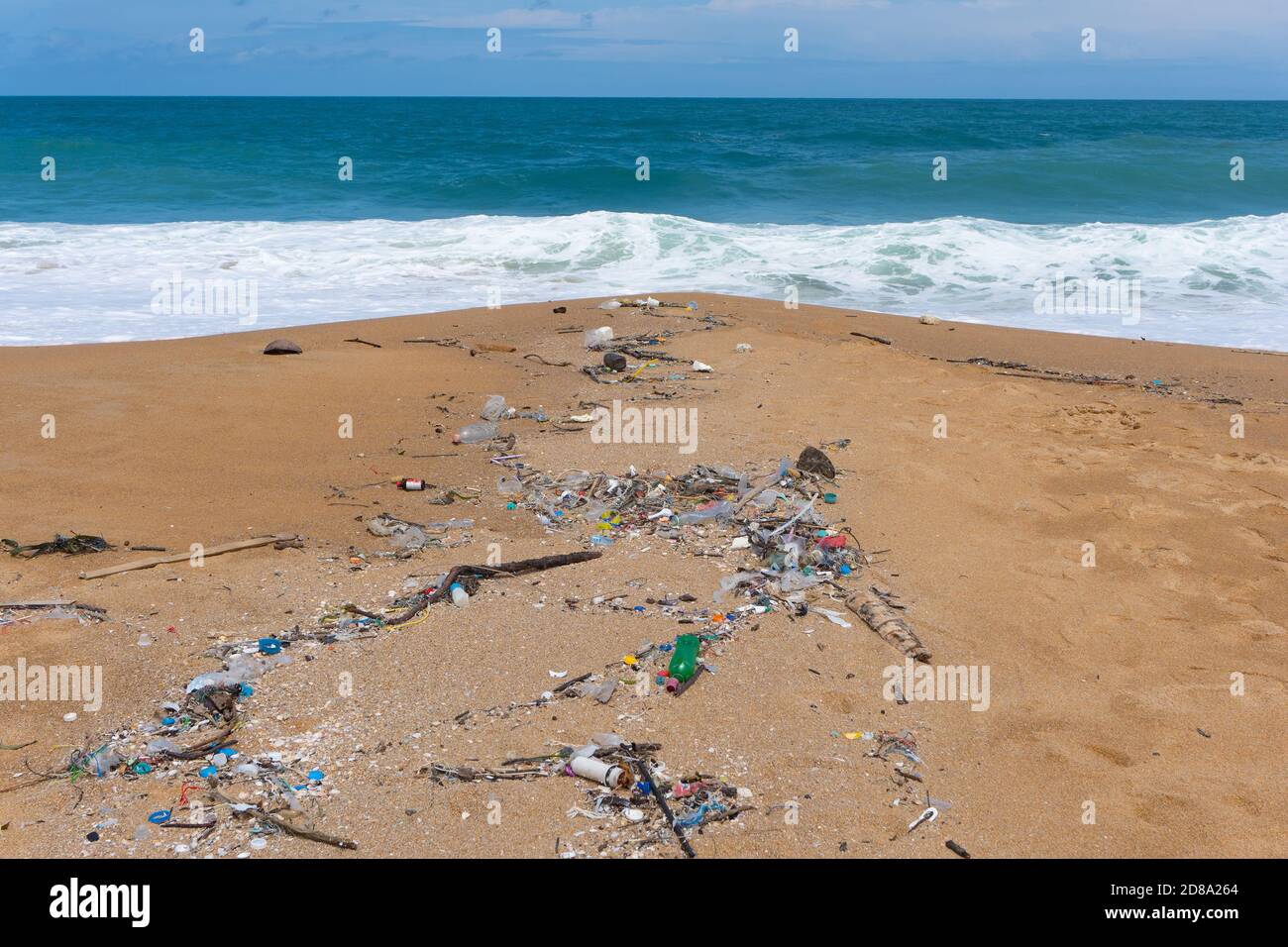 Plastic waste environment pollution on Mai Khao Beach, Phuket, Thailand. Stock Photo