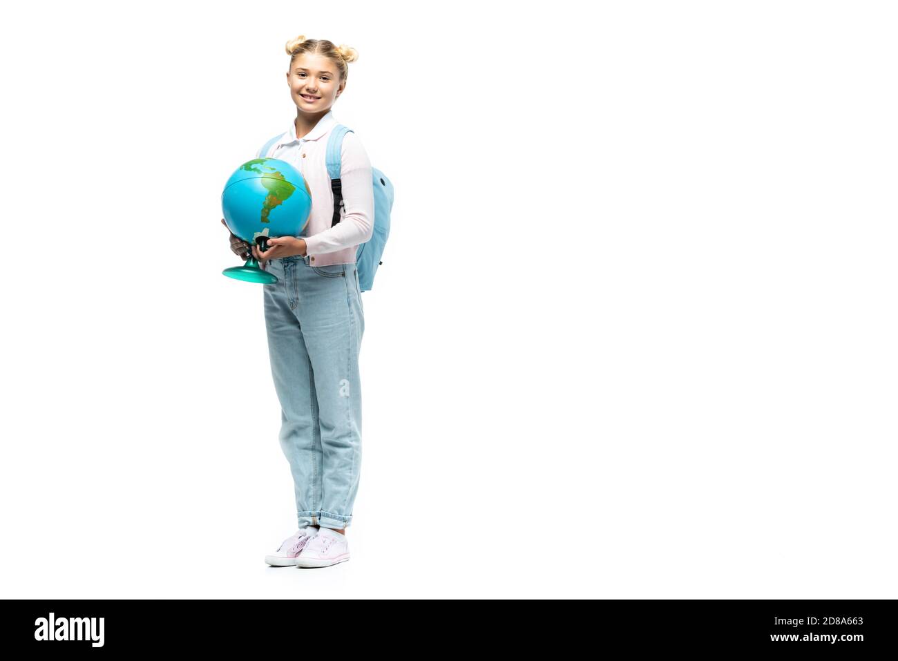 Schoolchild with backpack holding globe on white background Stock Photo