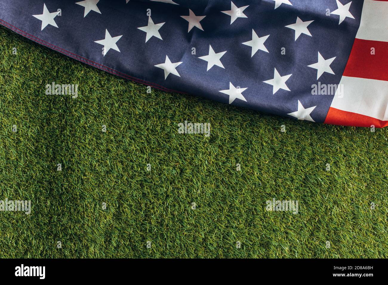 top view of american flag on green grass outside, labor day concept Stock Photo