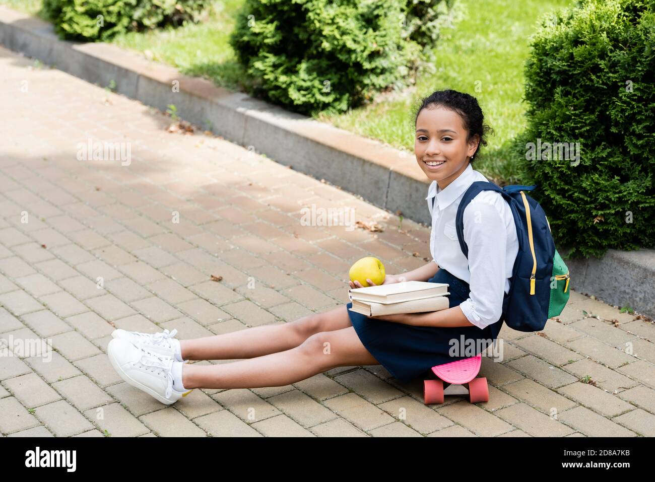 African girl uniform sitting school hi-res stock photography and images ...