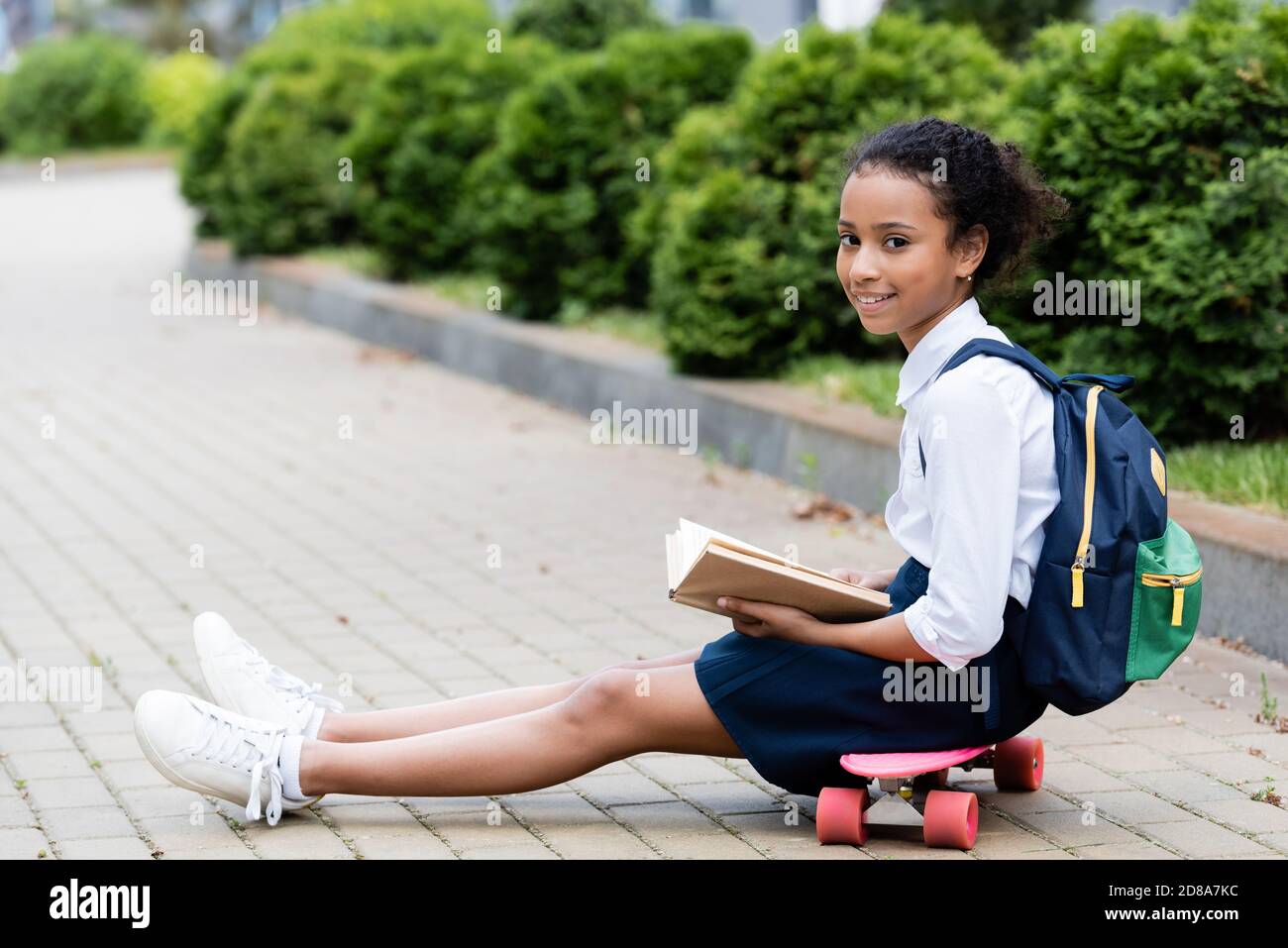 African girl uniform sitting school hi-res stock photography and images ...