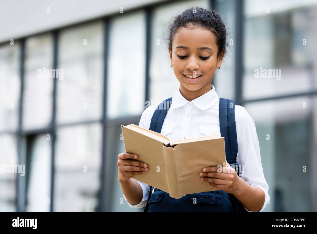 African school uniform reading hi-res stock photography and images - Alamy