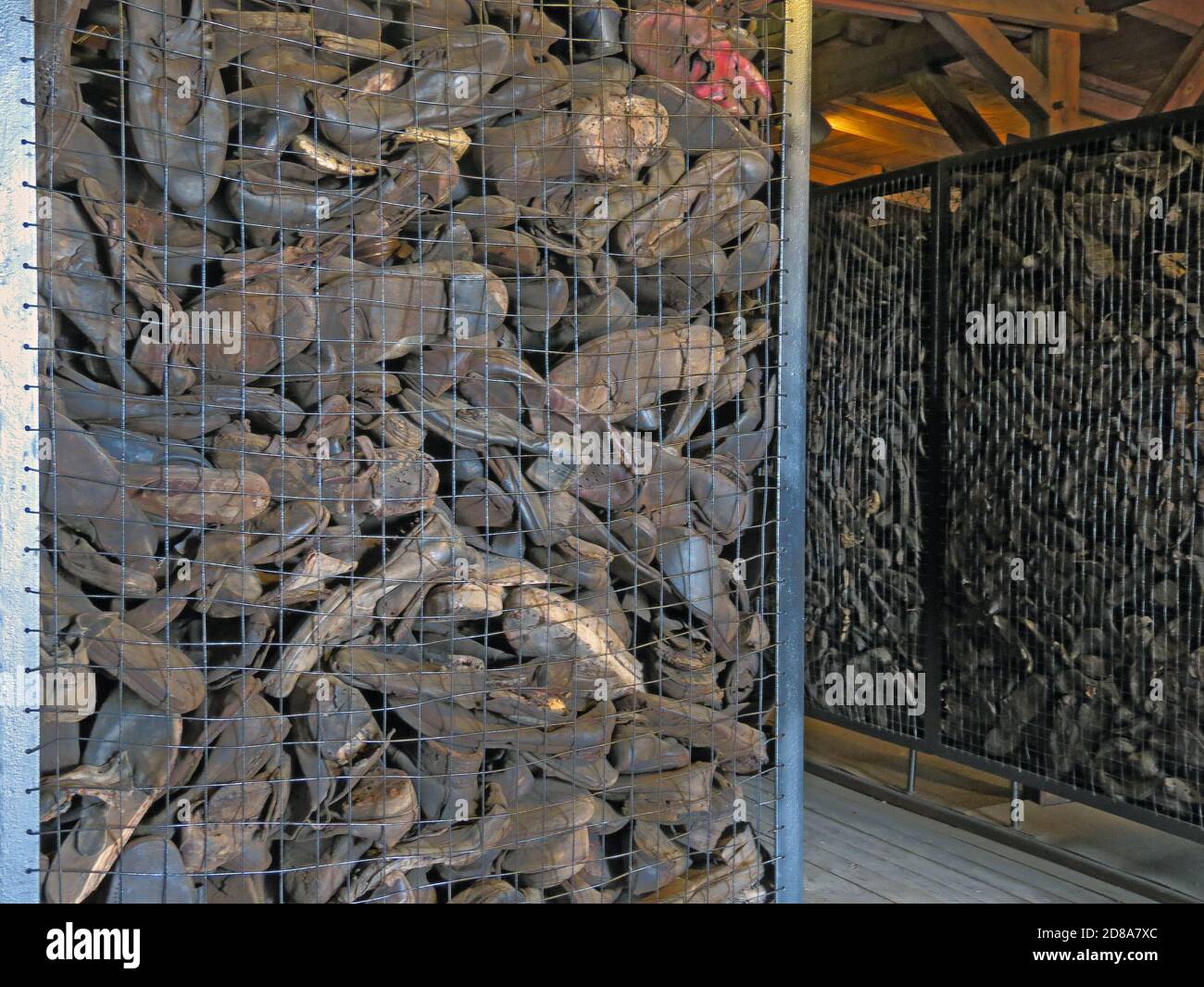 large cages with victims shoes in German concentration and extermination camp Majdanek. Lublin, Poland Stock Photo