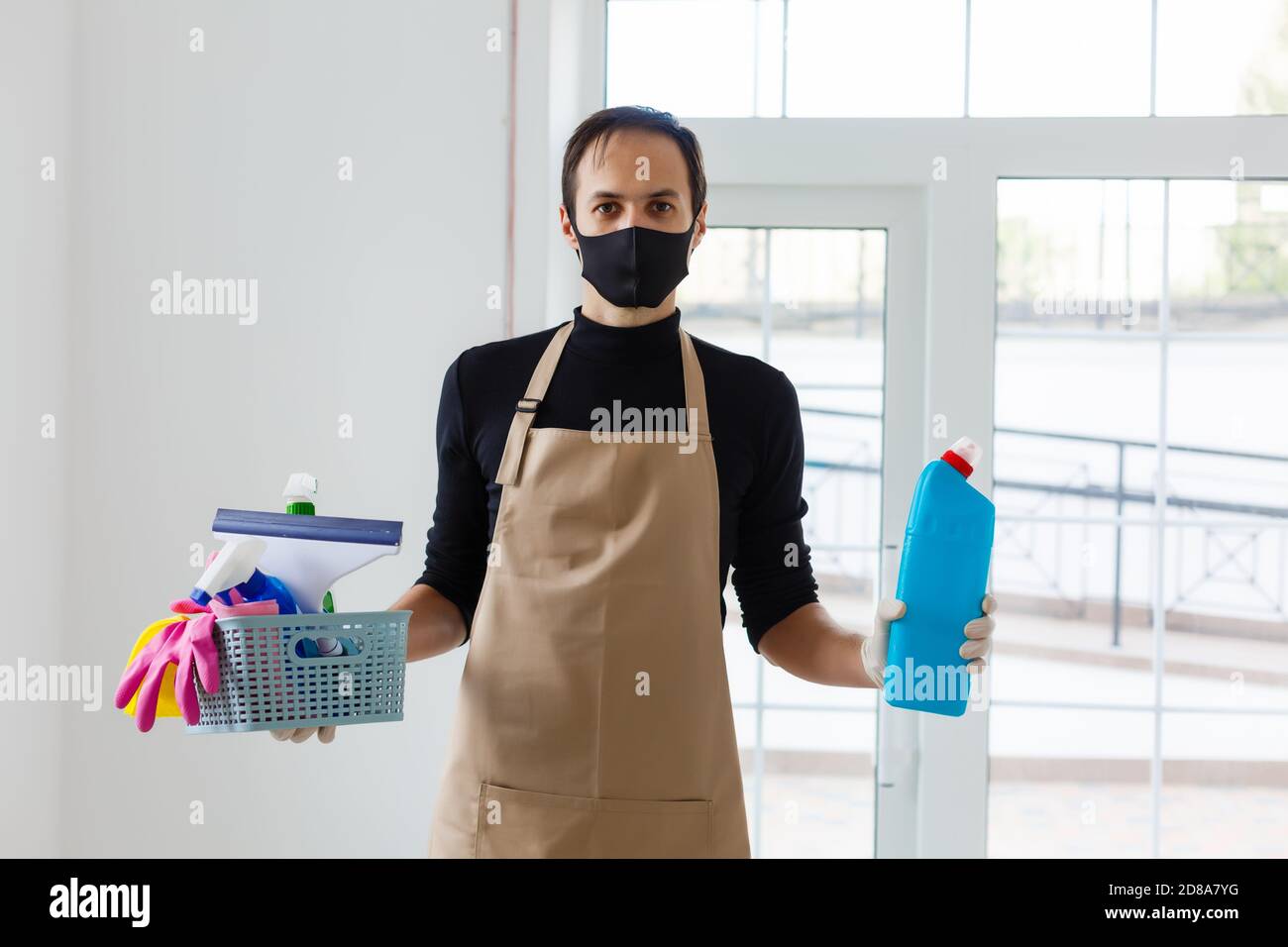 Cleaning and Disinfection at town complex amid the coronavirus epidemic. Professional teams for disinfection efforts. Infection prevention and control Stock Photo