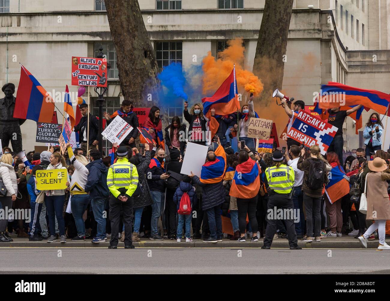 Peace for Armenia protest down Whitehall outside Downing Street. People setting off smoke flares and holding signs. London Stock Photo