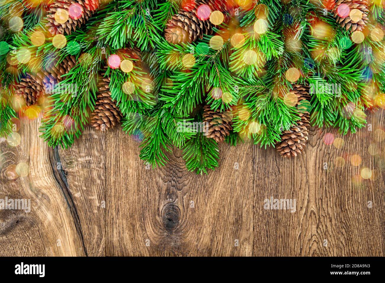 Christmas decoration colorful lights on wooden background Stock Photo