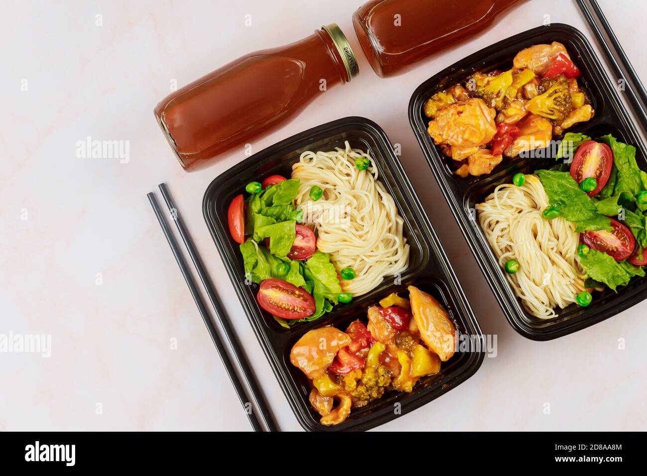 Chinese food in plastic container with chopstick. Food delivery concept ...