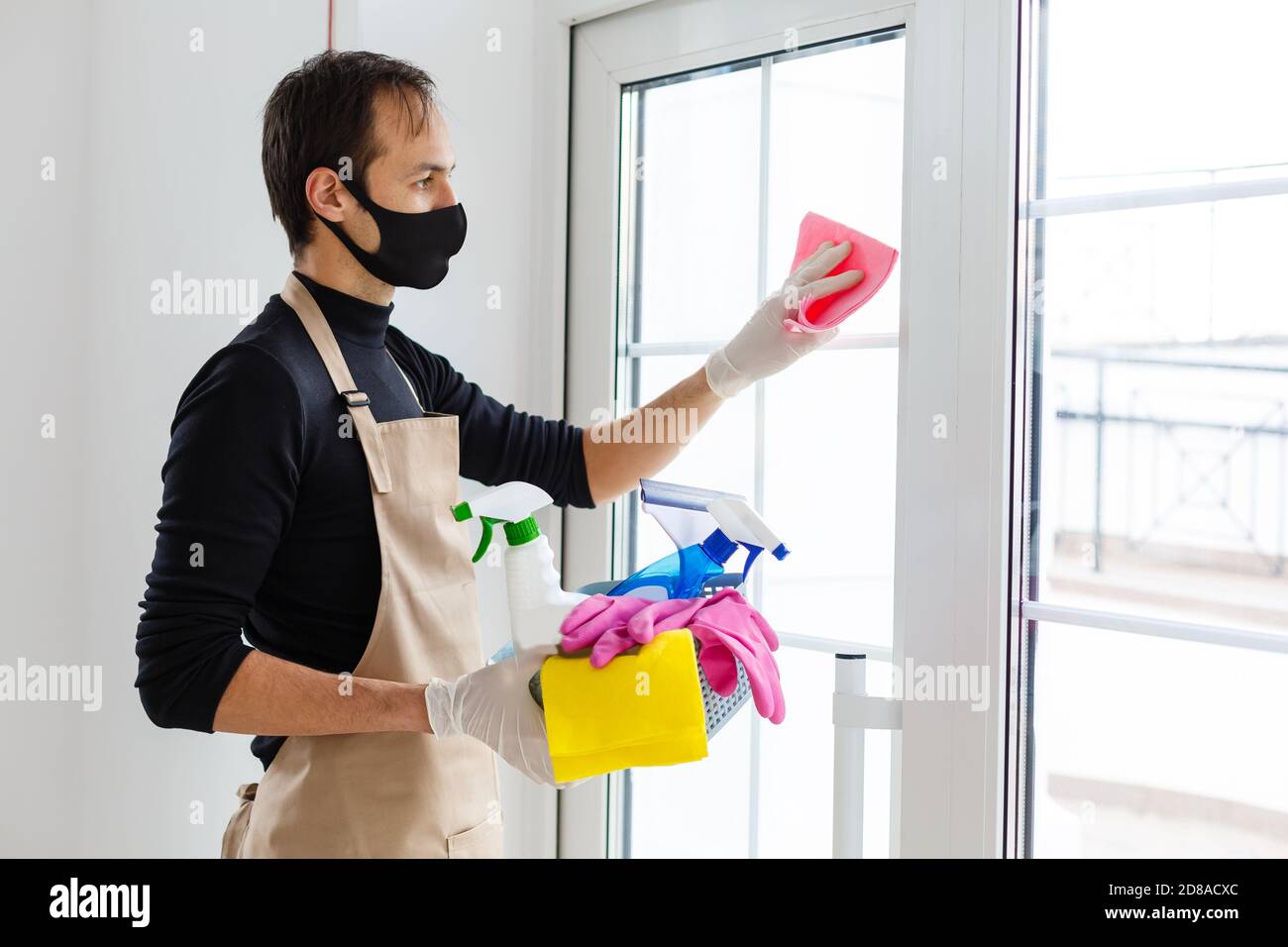 Cleaning and Disinfection at town complex amid the coronavirus epidemic. Professional teams for disinfection efforts. Infection prevention and control Stock Photo