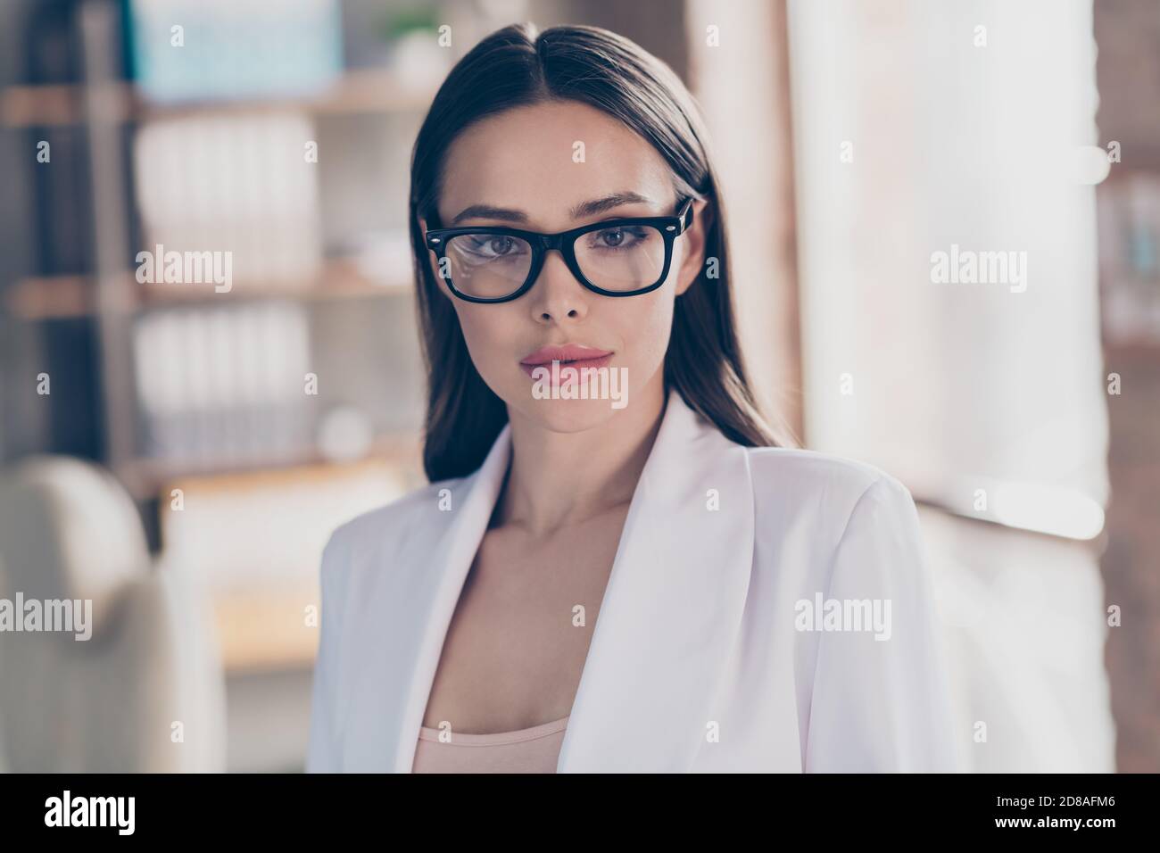 Closeup photo of attractive beautiful business lady eyesight health care concept look clever smart eyes camera home spacious office social distance Stock Photo