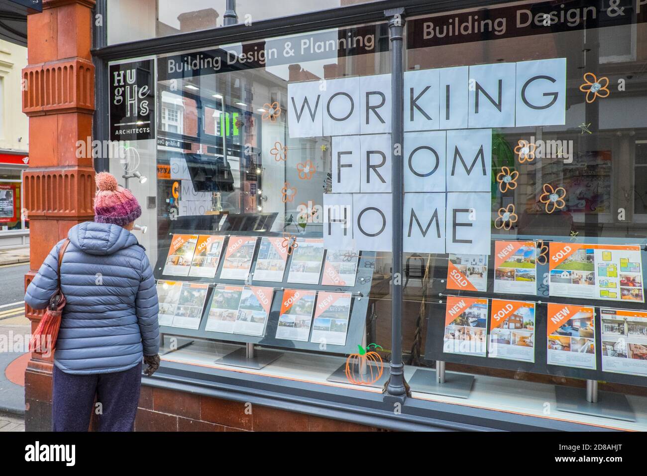Working from Home,due,to,Covid 19,restrictions,during,17 day, firebreak,circuit break,sign,signage,in,shop window,of,Alexanders,High Street,real estate,estate agent,estate agency,shop,business,in,Aberystwyth,Aberystwyth Town,town,town centre, town centre,Cardigan Bay,coast,coastal,student,student town,Wales,Mid Wales,West Wales,Welsh,Europe, Firebreak,circuit break,lockdown,imposed,by,devolved,WAG,Welsh Assembly Government,Welsh Government,Wales Covid Rule apply,Wales Covid rules,Covid in Wales,in,Coronavirus,mobile,covid,estate agent covid, Stock Photo