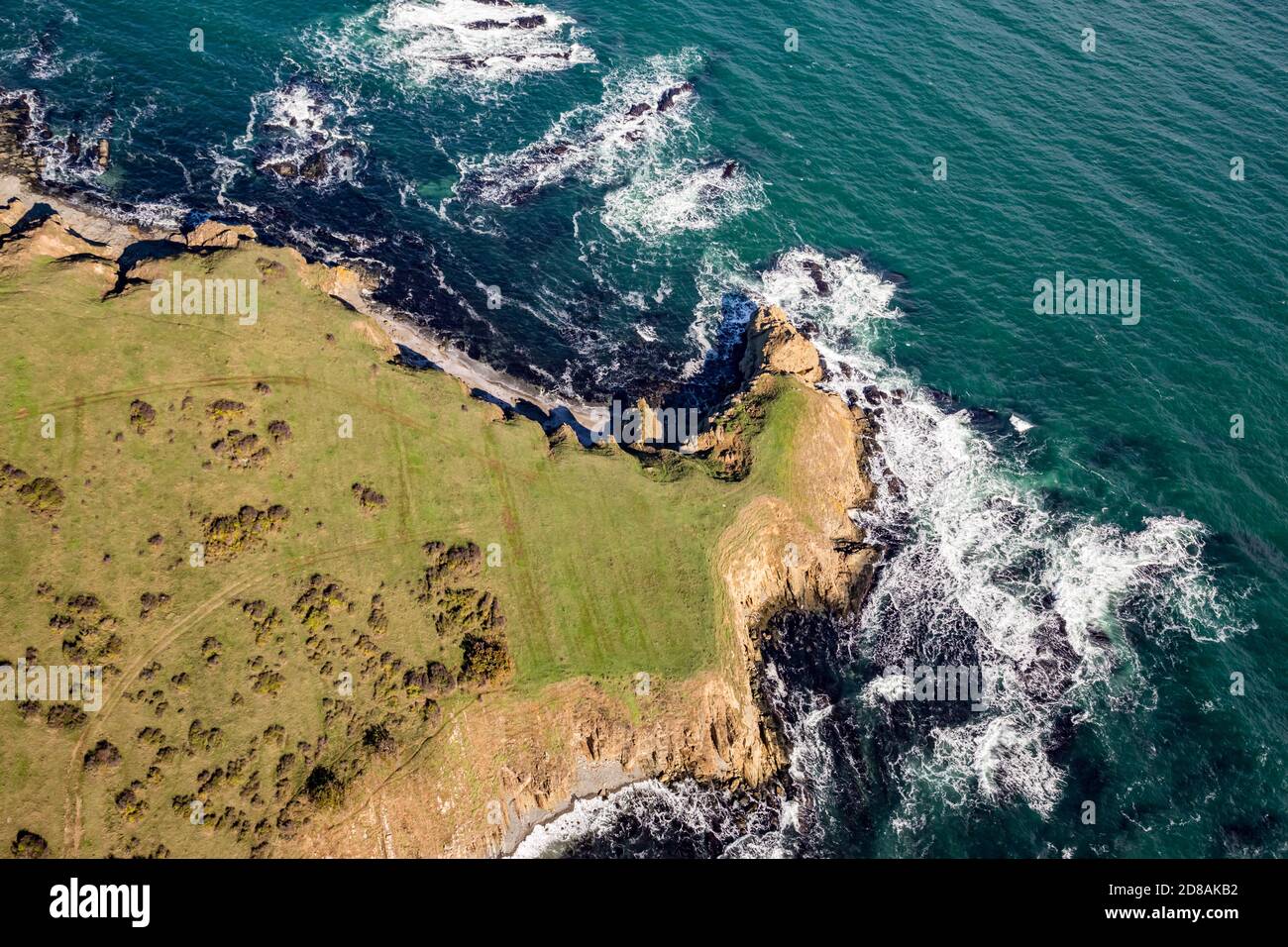 Shore cliffs, waves. Tandem motor paragliding over Black Sea shores near town of Ahtopol. Sunny autumn day, scenery colors and amazing landscapes and seascapes, Bulgaria Stock Photo