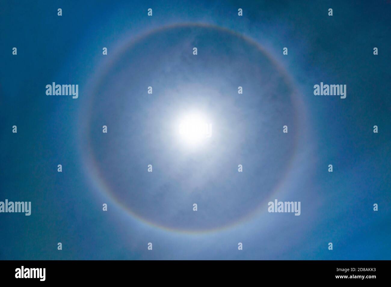 Fantastic Beautiful Sun Halo Phenomenon in the sky. Rainbow Ring around