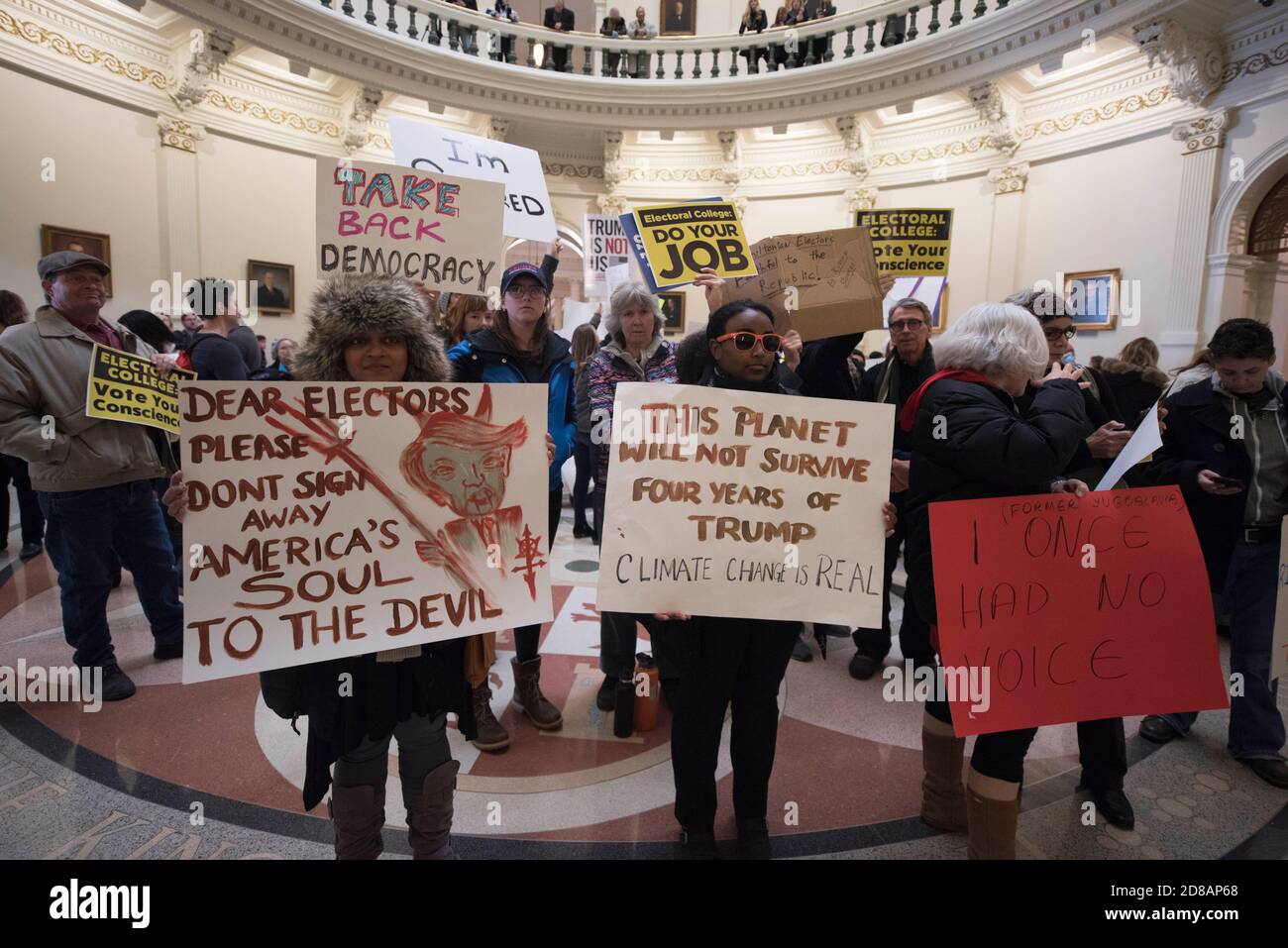 Austin Texas December 19, 2016: Protesters demonstrating alleged Russian interference in the U.S. presidential election gather in the rotunda of the Texas Capitol as Texas electors to the U.S. Electoral College meet at the Texas Capitol to cast votes for President Donald Trump and Vice-President Mike Pence. Stock Photo