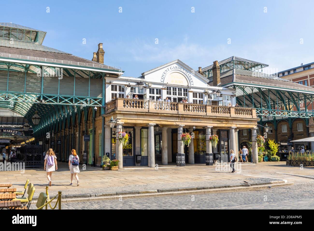 Exterior of the historic Covent Garden Market building and uncrowded restaurants in the coronavirus pandemic in Covent Garden, London West End, WC2 Stock Photo