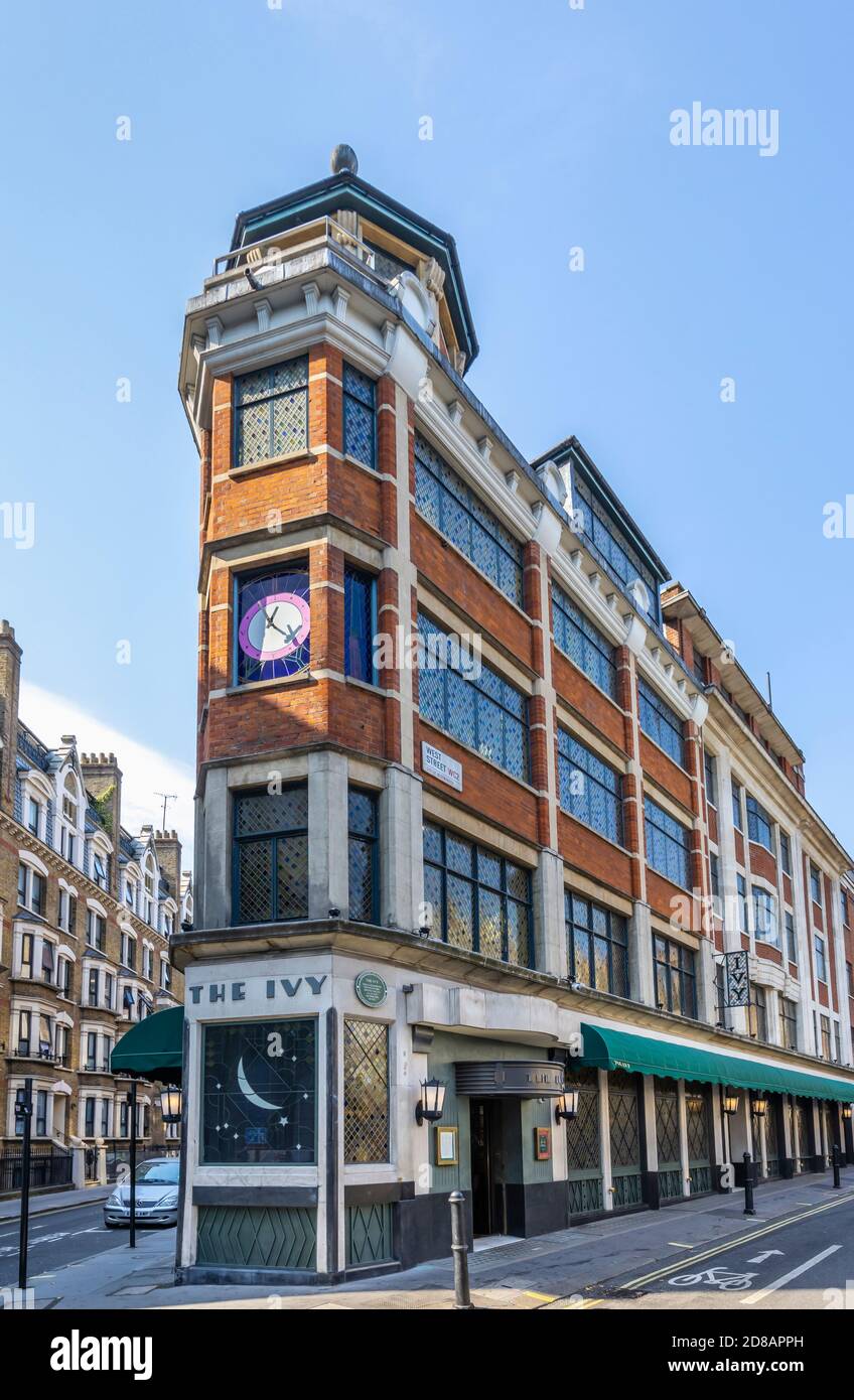 Street view of the exterior of the iconic up-market restaurant, The Ivy, in Theatreland in the West End of London, West Street WC2 Stock Photo