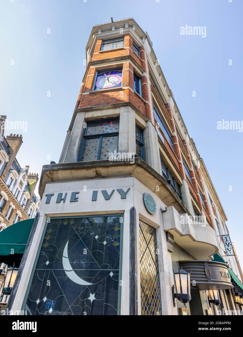 Street view of the exterior of the iconic up-market restaurant, The Ivy, in Theatreland in the West End of London, West Street WC2 Stock Photo