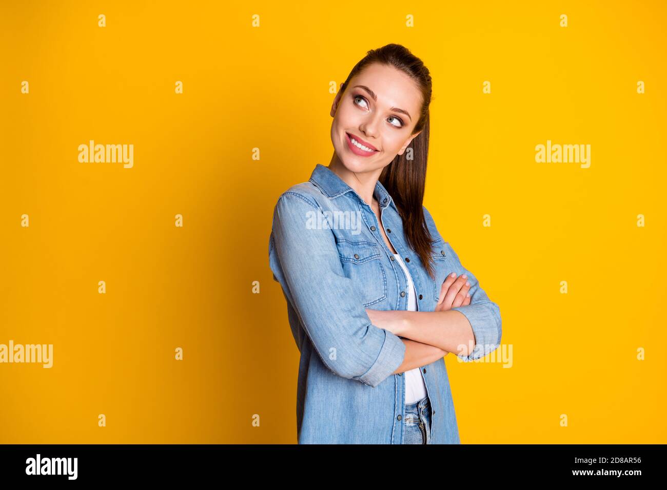 Turned photo of curious manager girl worker cross hands look copyspace  decide decision solution wear jeans clothes isolated over shine color Stock  Photo - Alamy