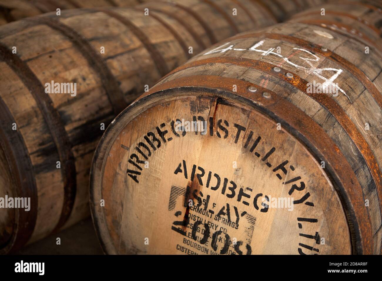 Rows of Scotch Whisky Barrels in a Warehouse Stock Photo