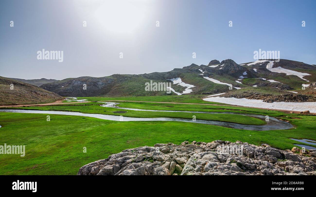 In the High Taşeli Plateau, settlements established on the slopes of the mountains, snow lakes and plants special to the region ... Images of Taşeli, Stock Photo
