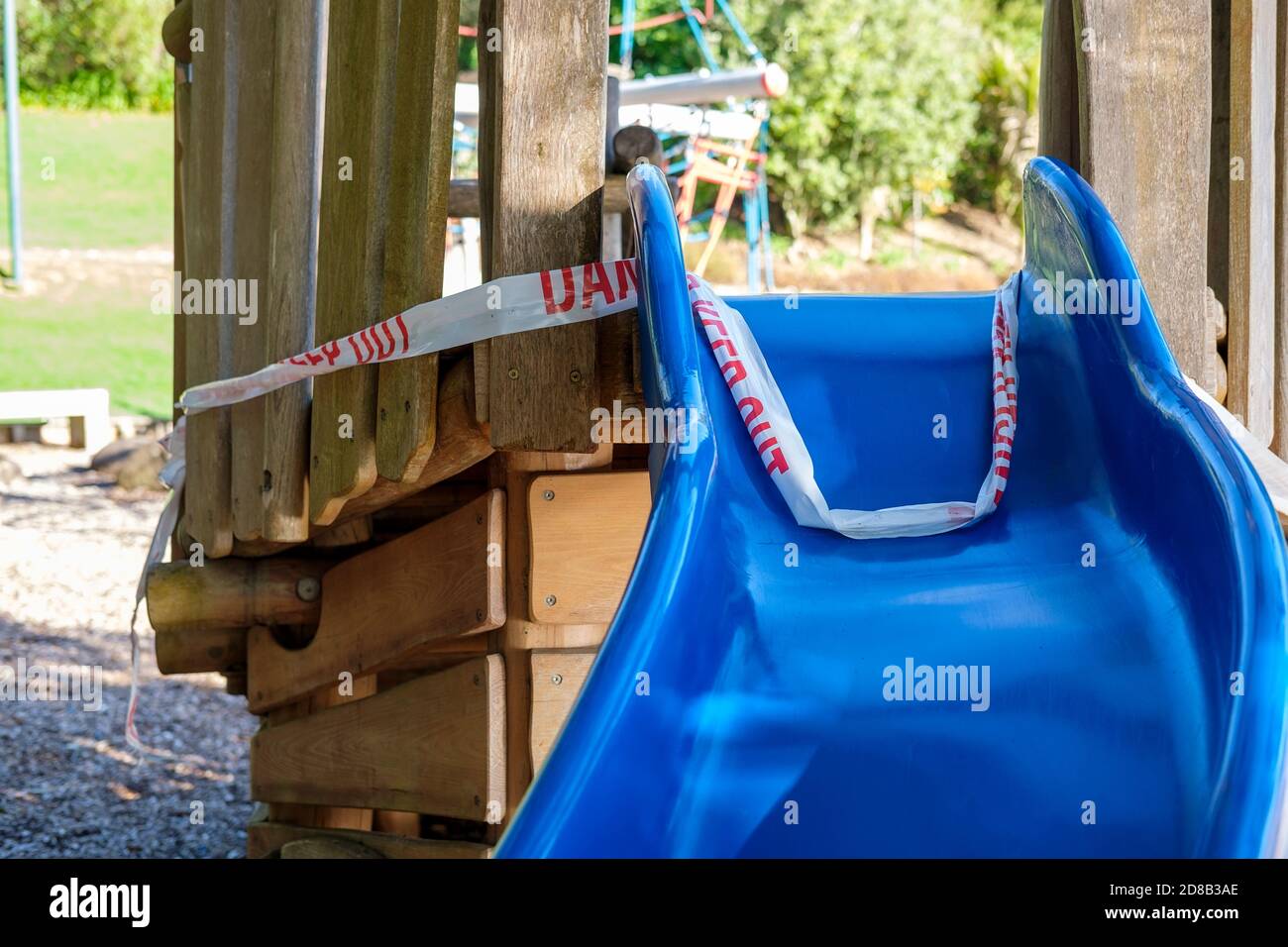 closed slide in a playground, COVID-19 Stock Photo