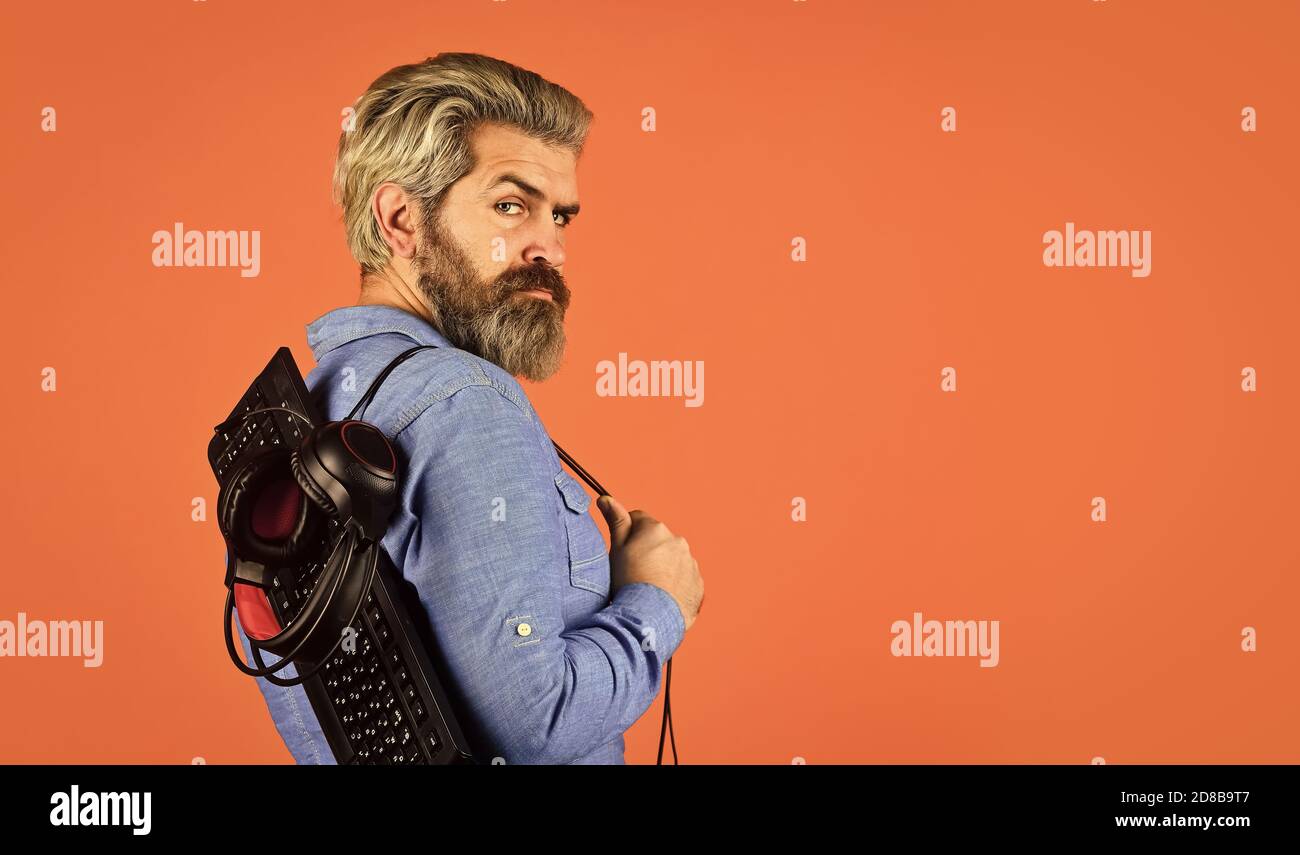 Mobile gadget dependence. Man bearded hipster play smartphone