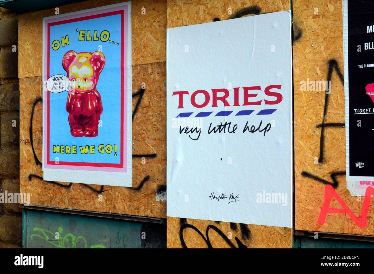 An Anti Tory poster, criticising the Conservative Party, in Manchester, Greater Manchester, England, United Kingdom, says: 'Tories Very Little Help'. This is in the context of the current  argument about whether the Government should do more to help feed children in England. MPs last week rejected a Labour Party motion to extend free school meals until Easter 2021 in order to stop children going hungry. The poster is in the style of a well known supermarket chain. Stock Photo