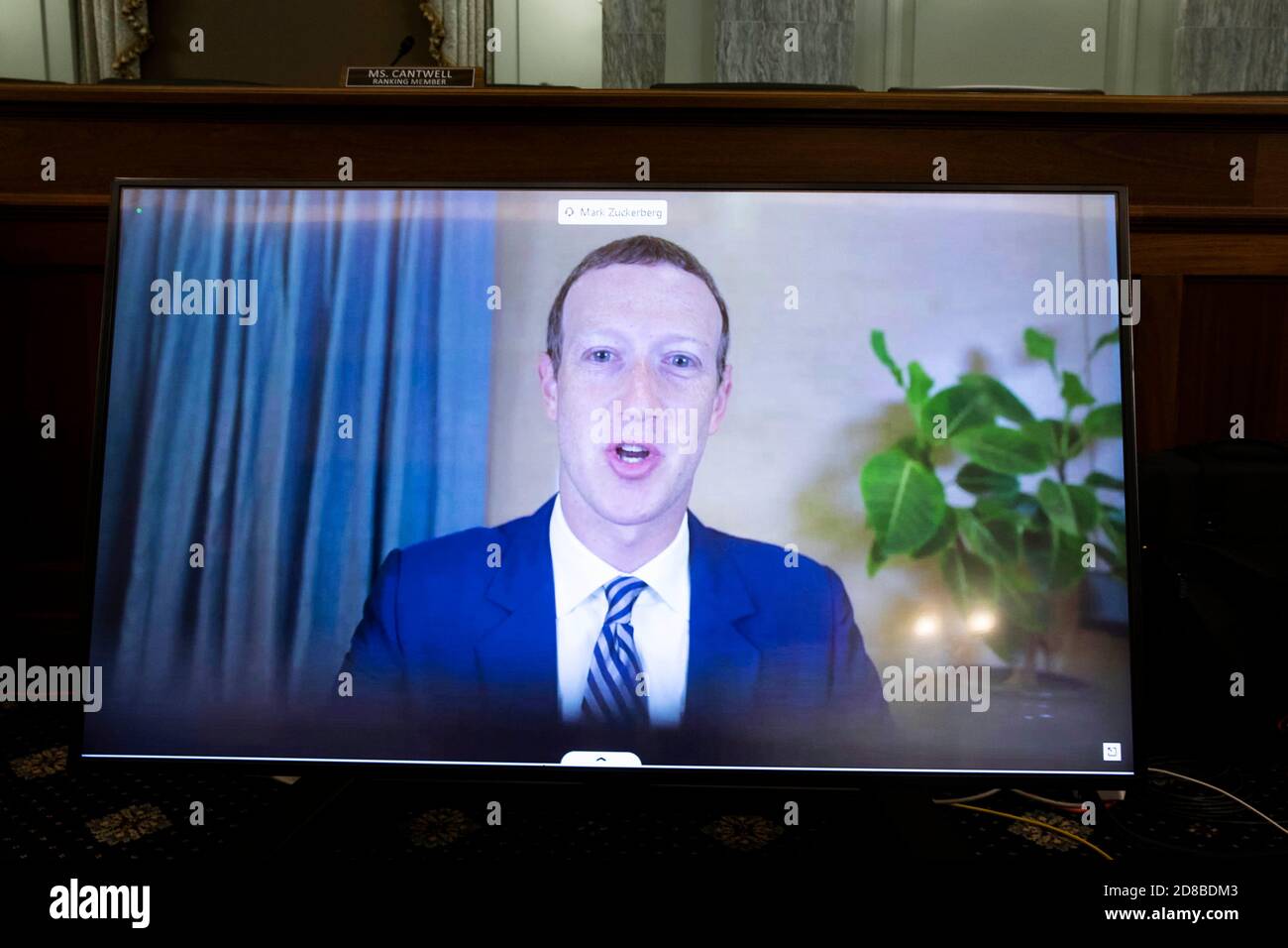 (201028) -- WASHINGTON, Oct. 28, 2020 (Xinhua) -- Facebook CEO Mark Zuckerberg is seen on a screen during the hearing of U.S. Senate Committee on Commerce, Science, and Transportation titled 'Does Section 230's Sweeping Immunity Enable Big Tech Bad Behavior?' on Capitol Hill in Washington, DC, the United States, on Oct. 28, 2020. (Michael Reynolds/Pool via Xinhua) Stock Photo