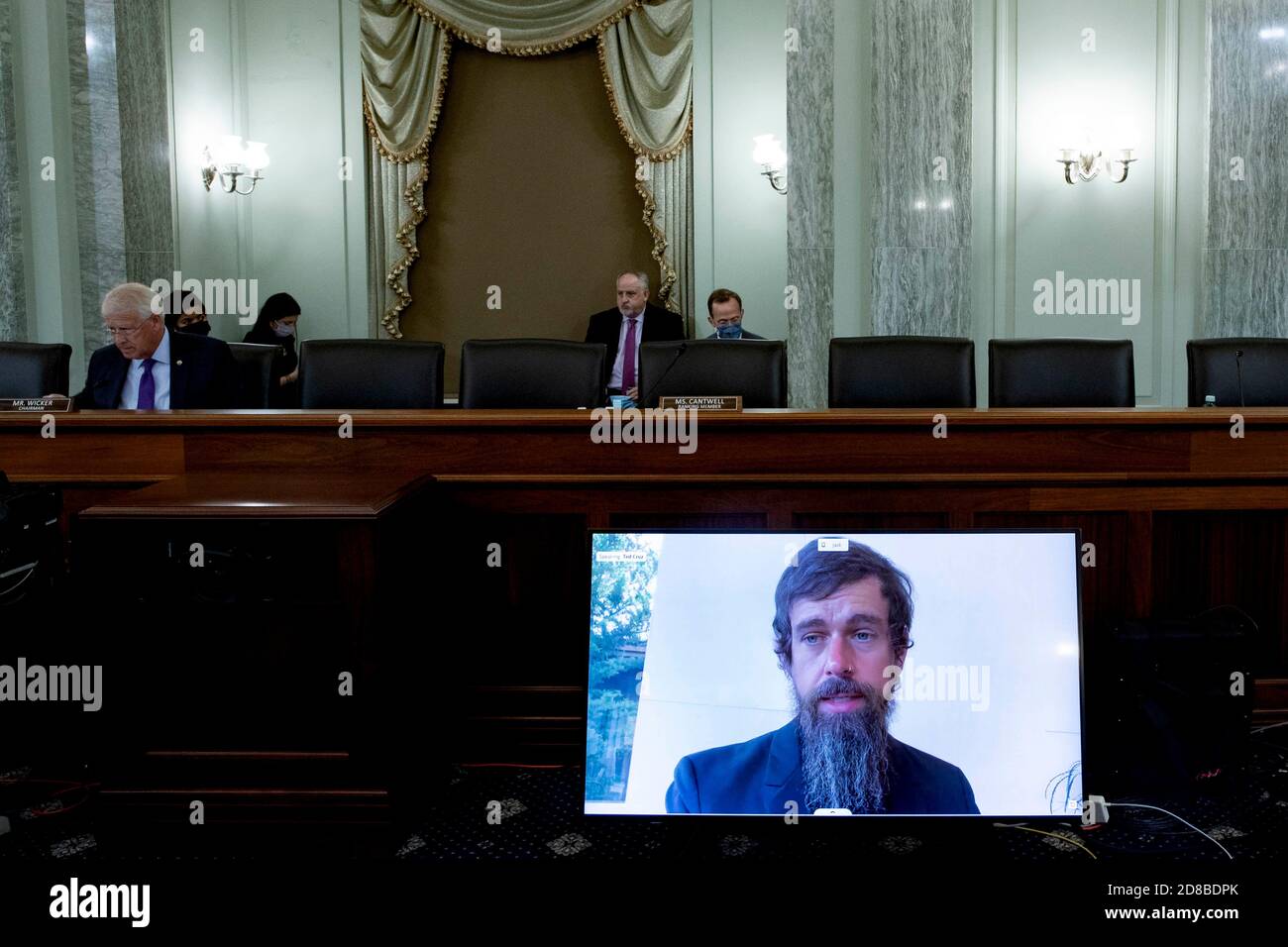 (201028) -- WASHINGTON, Oct. 28, 2020 (Xinhua) -- Twitter CEO Jack Dorsey is seen on a screen during the hearing of U.S. Senate Committee on Commerce, Science, and Transportation titled 'Does Section 230's Sweeping Immunity Enable Big Tech Bad Behavior?' on Capitol Hill in Washington, DC, the United States, on Oct. 28, 2020. (Michael Reynolds/Pool via Xinhua) Stock Photo